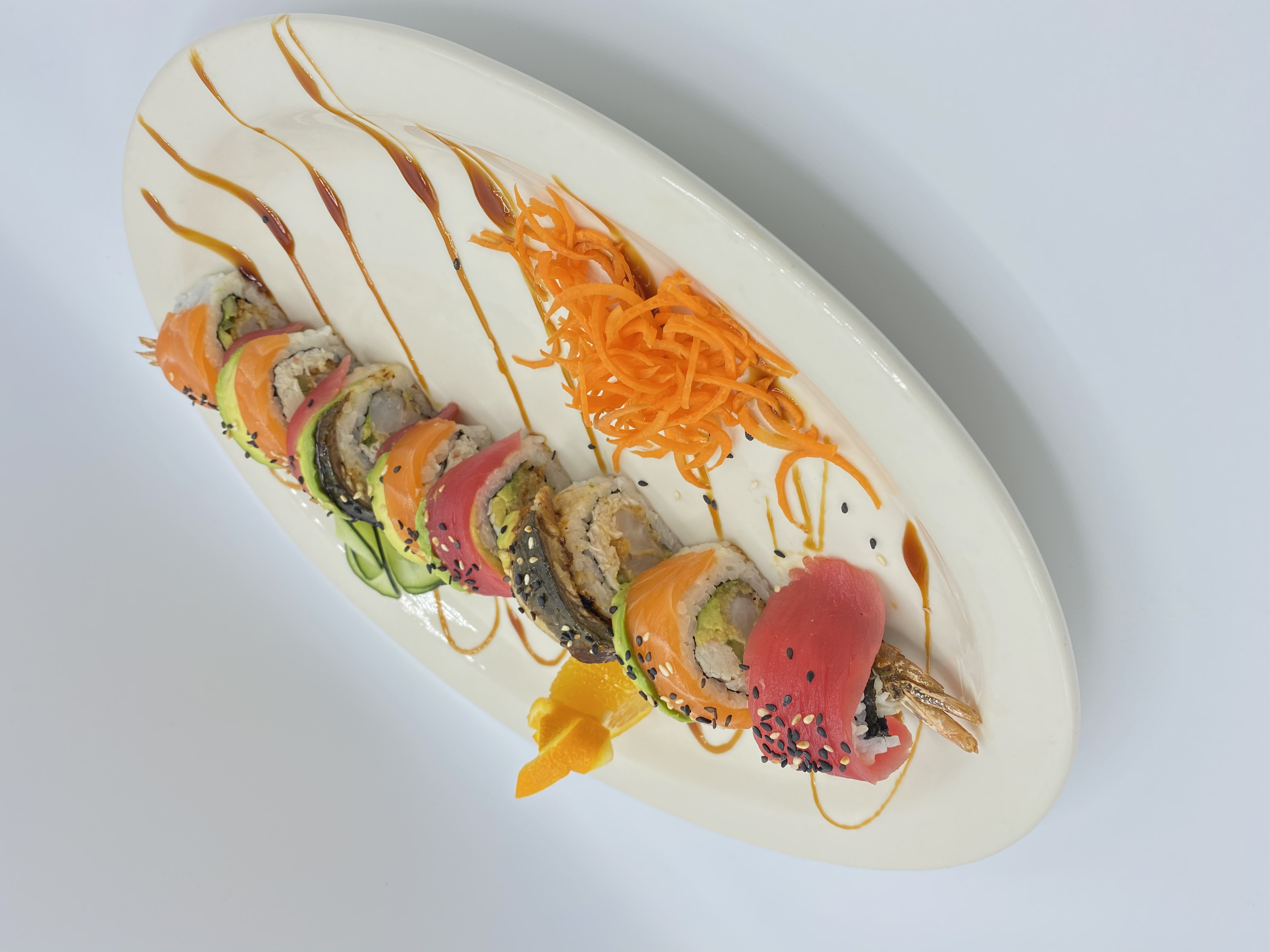 Order Rainbow Roll food online from Emporio Sushi & Mariscos store, Orange on bringmethat.com