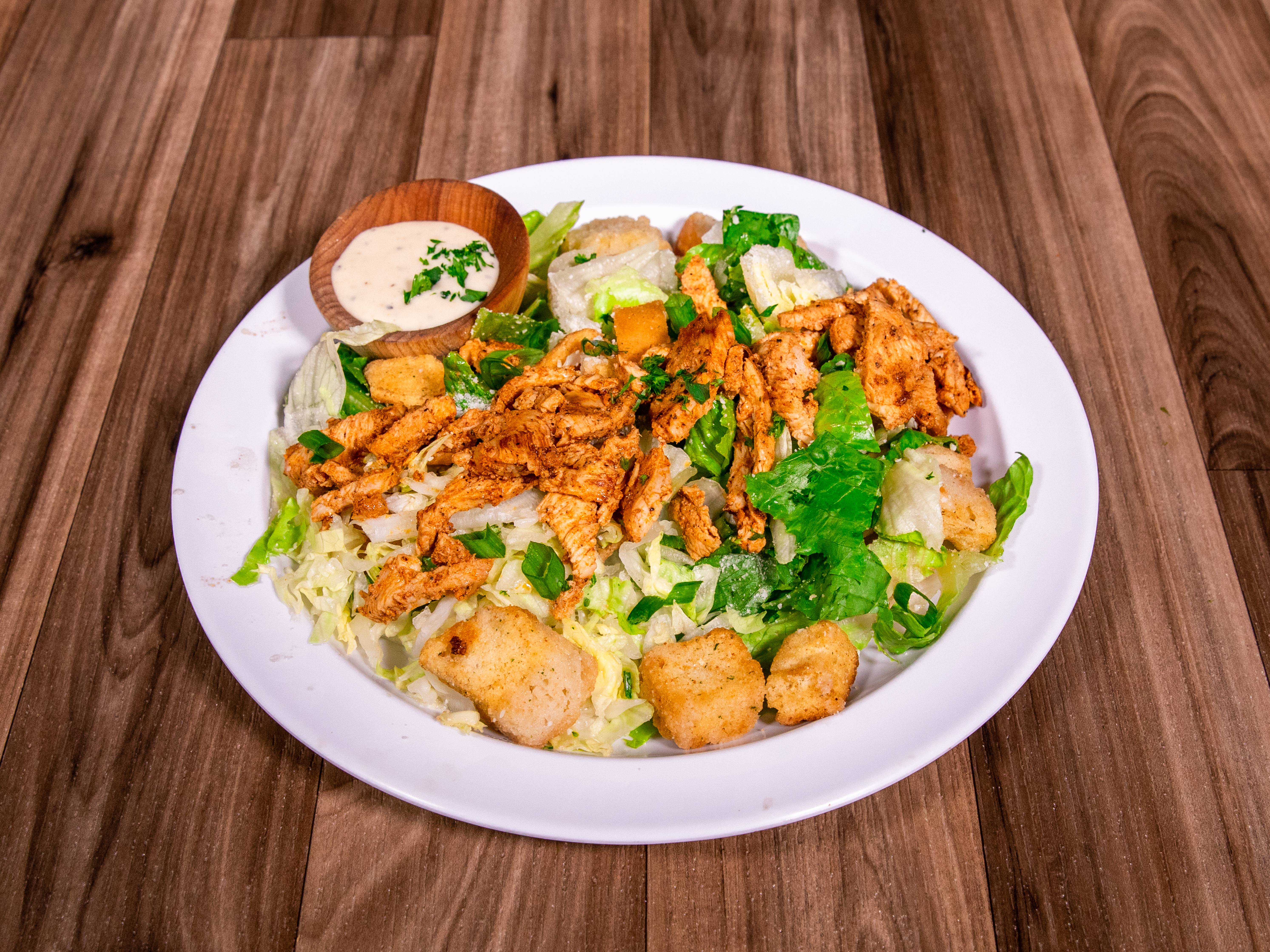 Order Chicken Caesar Salad food online from Genghis Grill store, Hurst on bringmethat.com