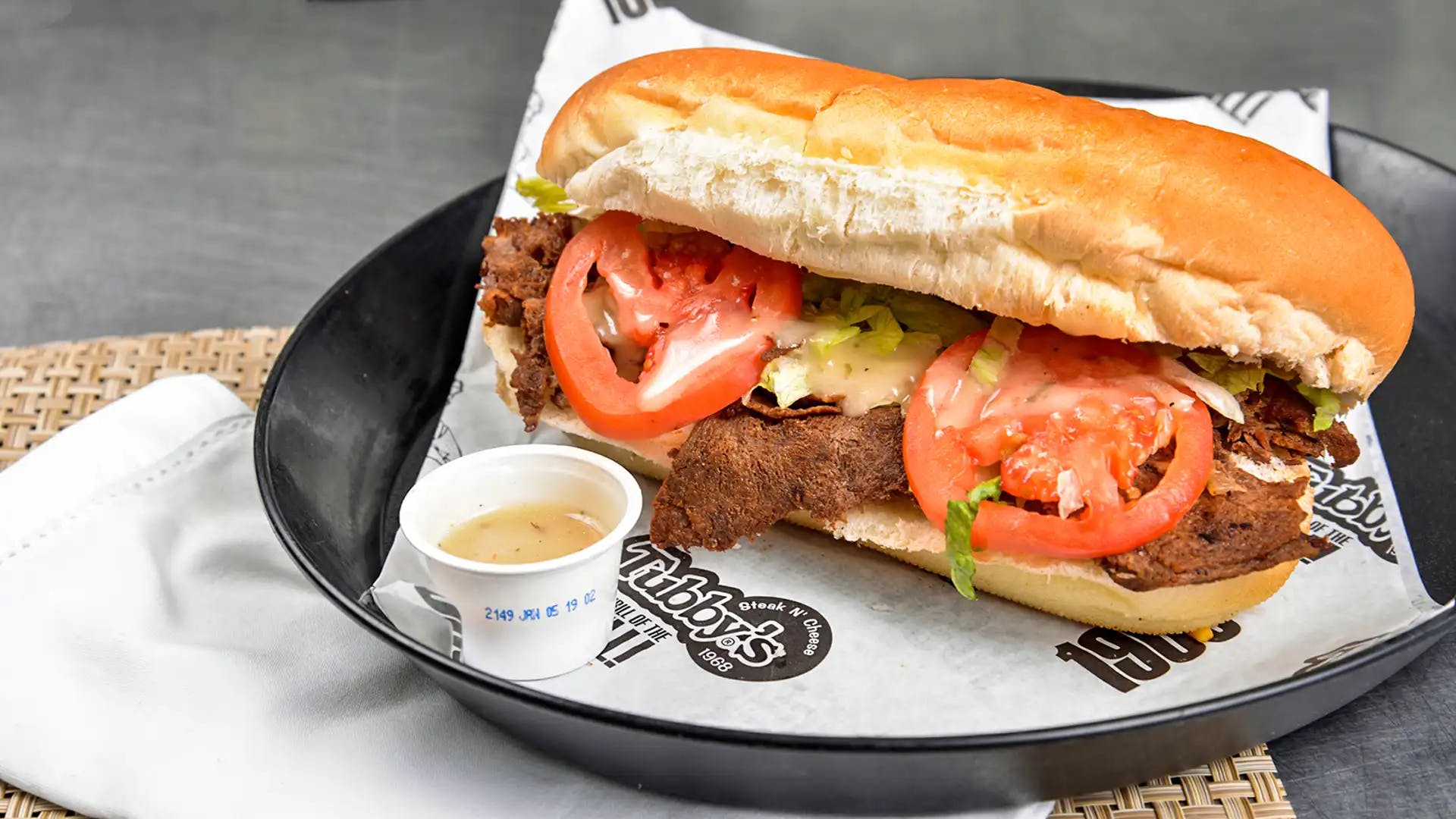 Order Steak & Cheese Sub - Small food online from Tubby's Grilled Submarines store, Westland on bringmethat.com