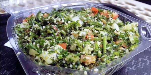 Order Tabbouleh Salad food online from Falafel's Drive-In store, San Jose on bringmethat.com
