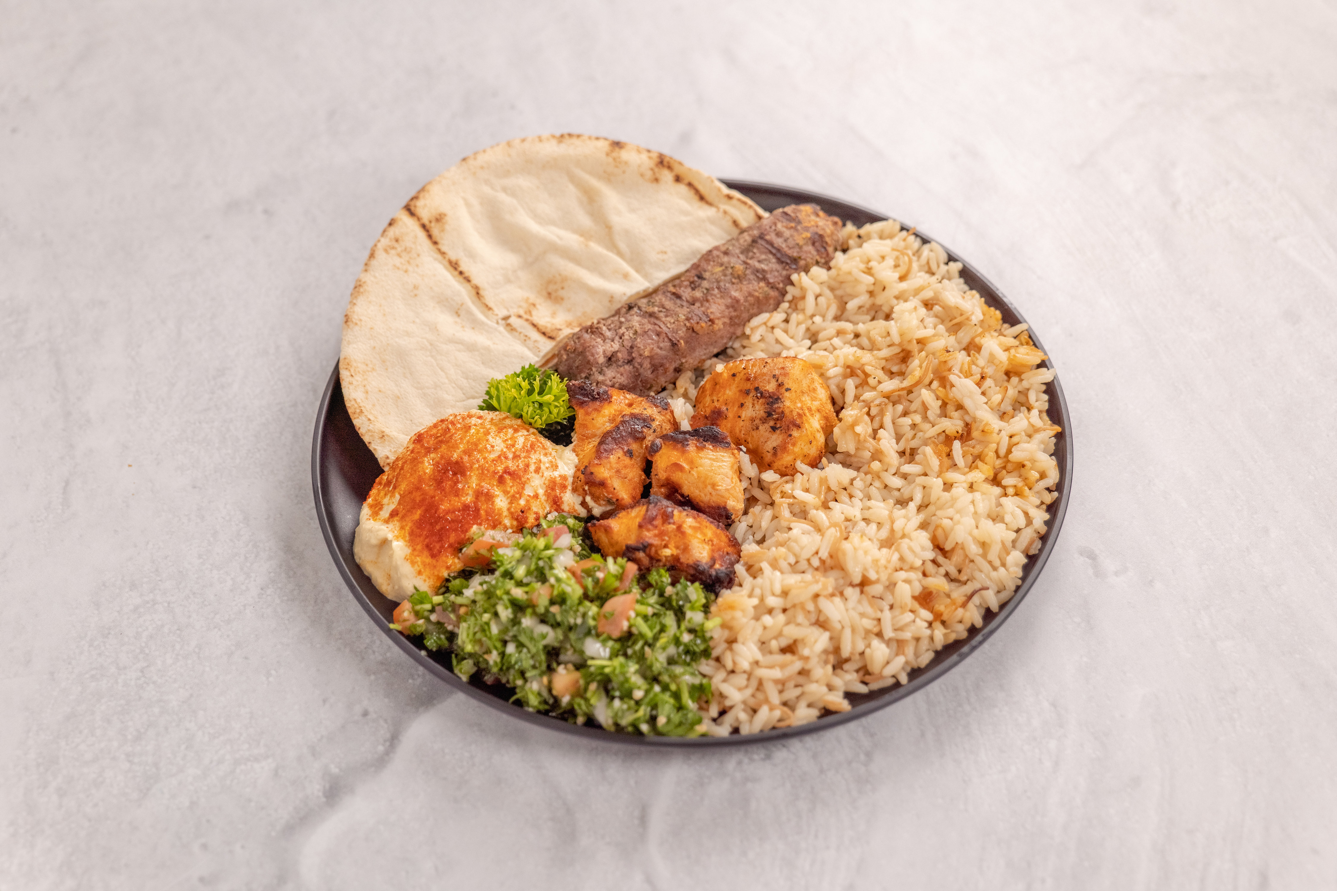 Order 4. Combo Kabab Platter food online from Byblos Mediterranean Grill store, Anaheim on bringmethat.com
