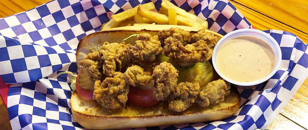 Order Oyster Po Boy Sandwich food online from Cajun Crab store, Irving on bringmethat.com