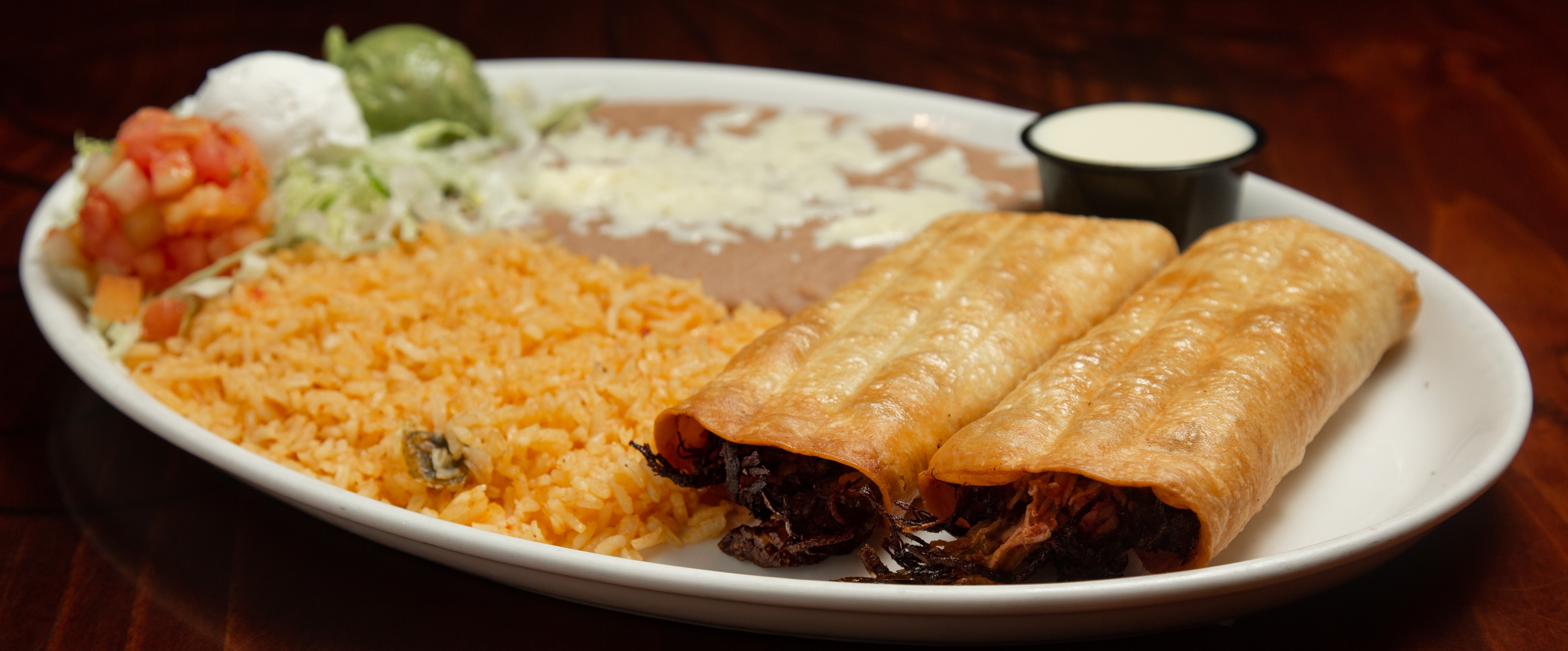 Order Chimichangas food online from Tito Mexican Restaurant store, Spring Hill on bringmethat.com