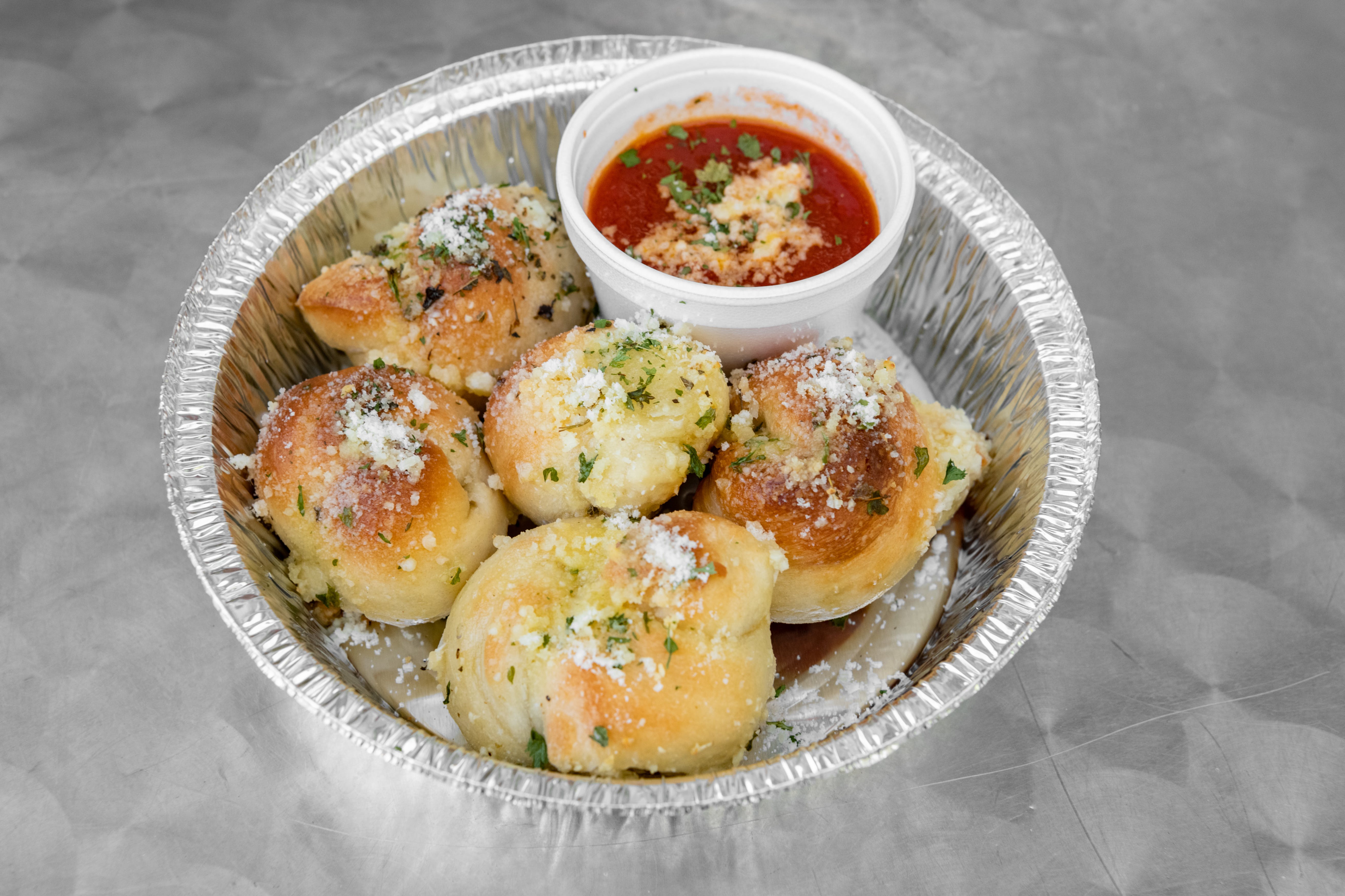 Order Garlic Knots - 5 Pieces food online from Vinnie Pizzeria store, Martinez on bringmethat.com