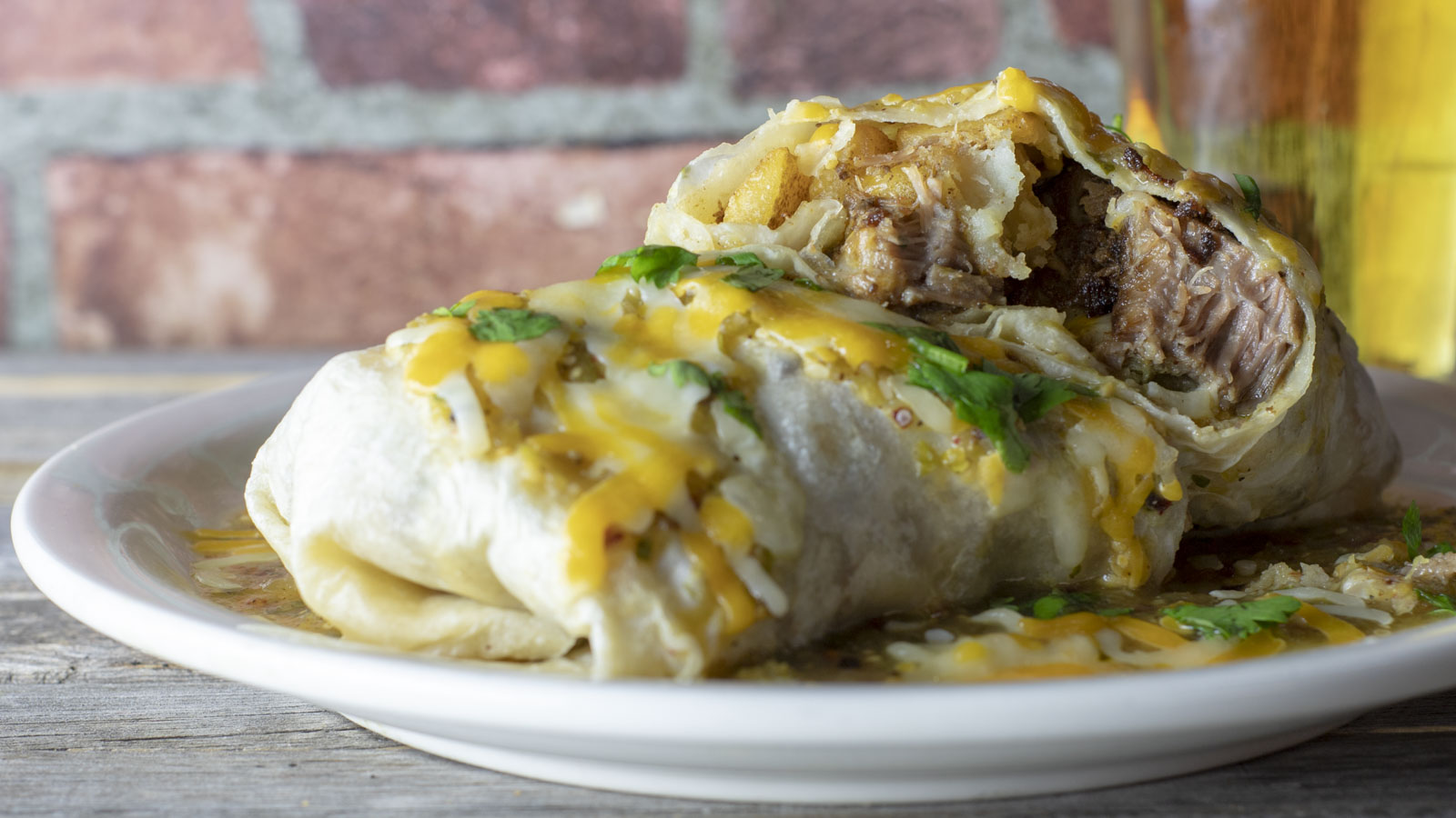 Order Monster Pork Wet Burrito food online from Events Sports Grill store, Riverside on bringmethat.com