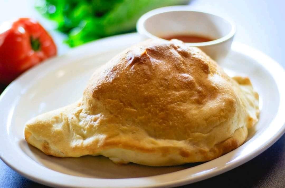 Order Cheese Calzone - Single food online from New York Pizza store, Hartwell on bringmethat.com