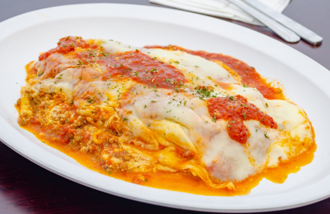 Order Lasagna - Pasta food online from Mulberry Street Pizza store, Newark on bringmethat.com