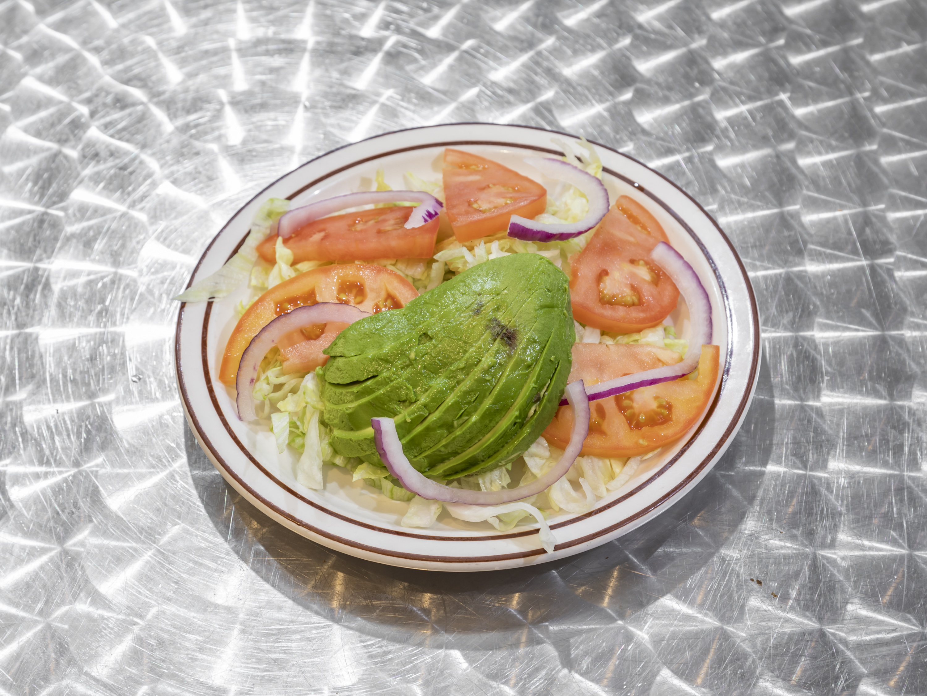 Order Lettuce, Tomato and Avocado Salad food online from El Nuevo Portal store, Brooklyn on bringmethat.com