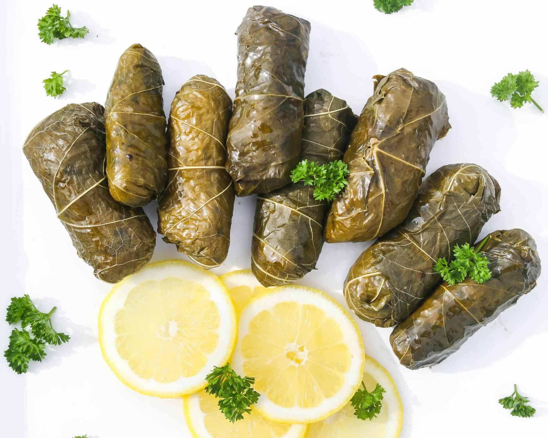 Order Dolma - 6 Pieces food online from Sicilian Pizza store, Alexandria on bringmethat.com