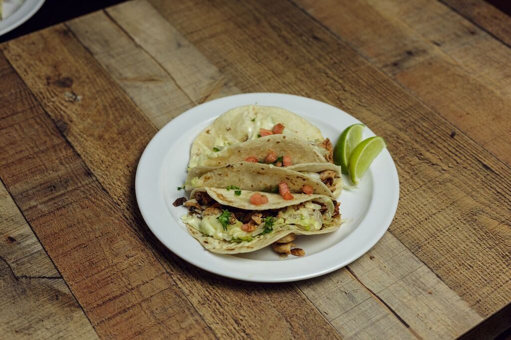 Order Grilled Chicken Tacos food online from La Parrilla Mexican Restaurant store, Lubbock on bringmethat.com