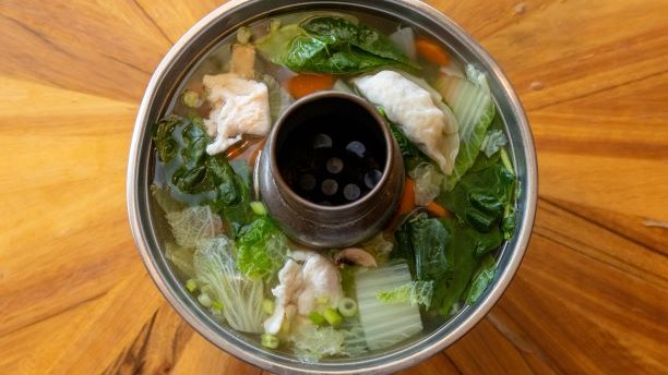 Order 14. Chicken Wonton Soup food online from Peppers Thai Cuisine store, Palm Desert on bringmethat.com