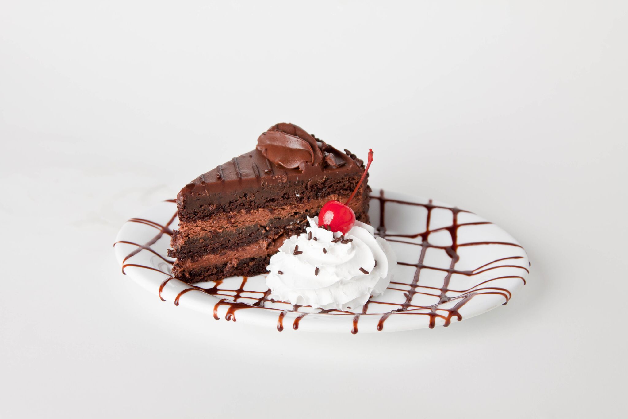 Order Double Decker Chocolate Cake food online from Wingsn More store, Austin on bringmethat.com