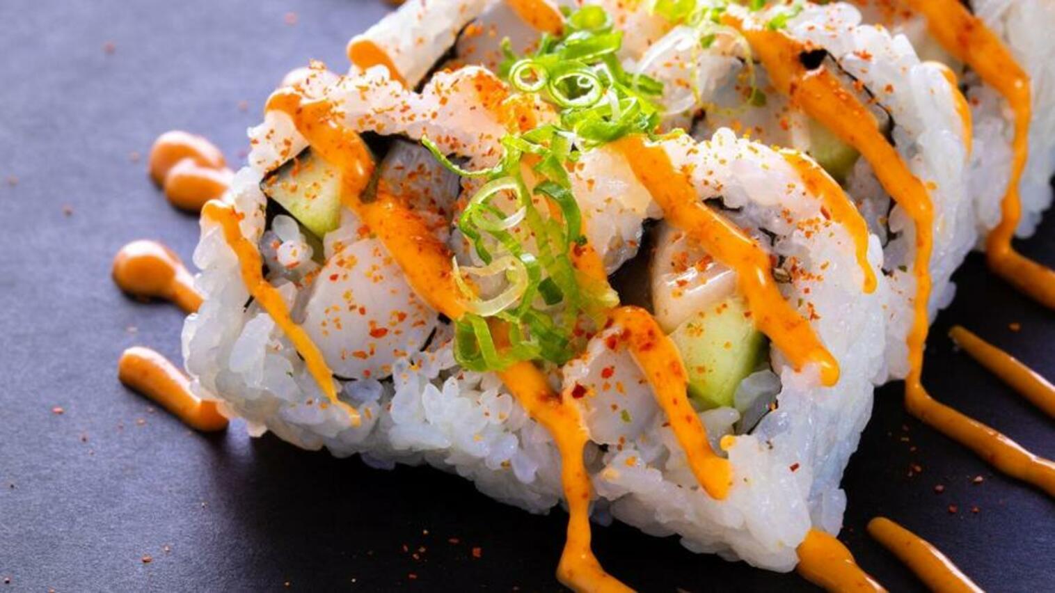Order (e041) Spicy Scallop Roll food online from Sushi Stop store, Los Angeles on bringmethat.com