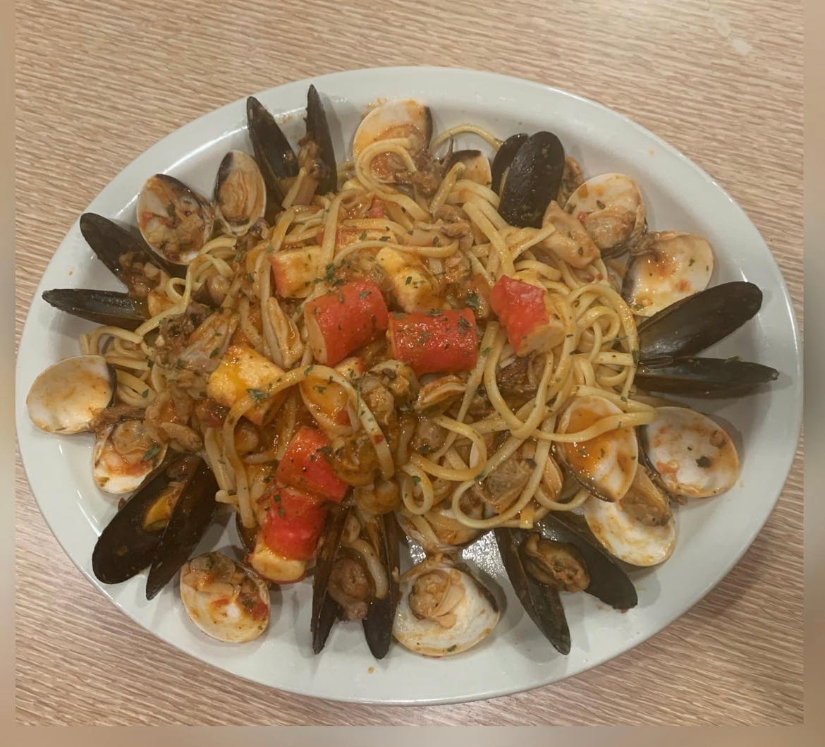 Order 12. Seafood Pasta - Pasta food online from Village Cafe & Pizza store, Los Angeles on bringmethat.com