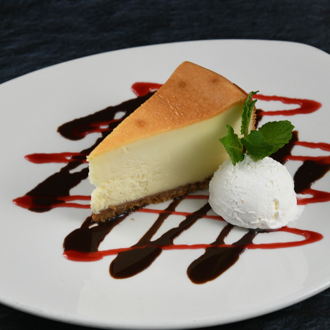Order Cheesecake food online from Rainforest Cafe store, Las Vegas on bringmethat.com