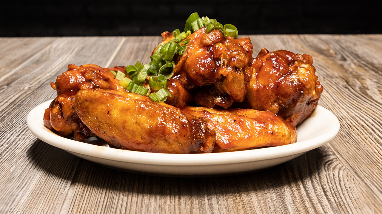 Order BBQ Wings 11ct food online from DMK Burger Bar store, Chicago on bringmethat.com