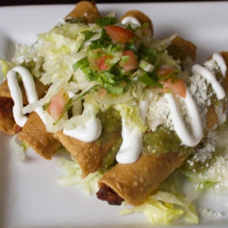 Order Fried Potato Taquitos food online from Tatas Tacos store, Chicago on bringmethat.com