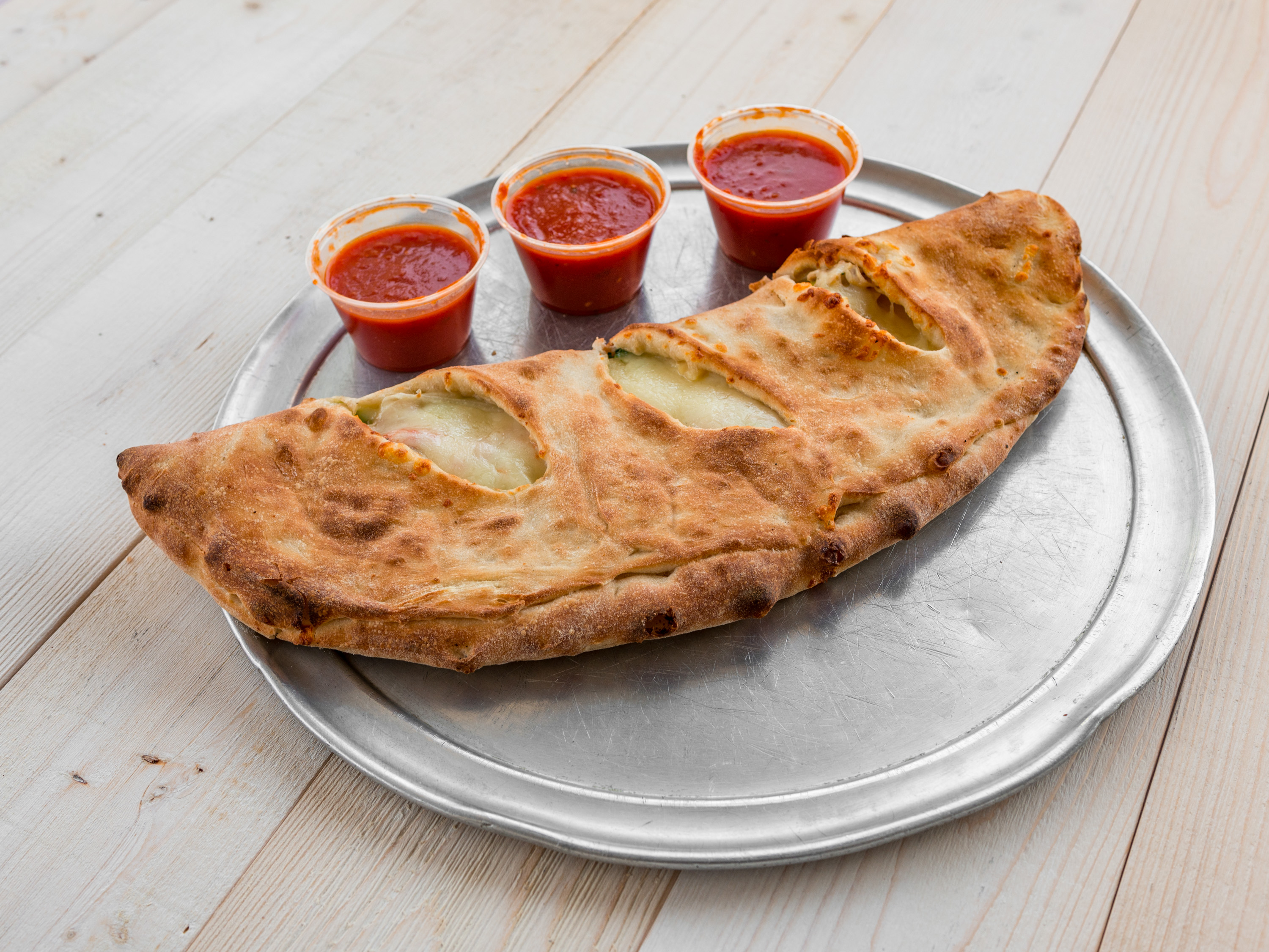 Order Cheese Calzone food online from Carmelo's Pizza store, Boyertown on bringmethat.com