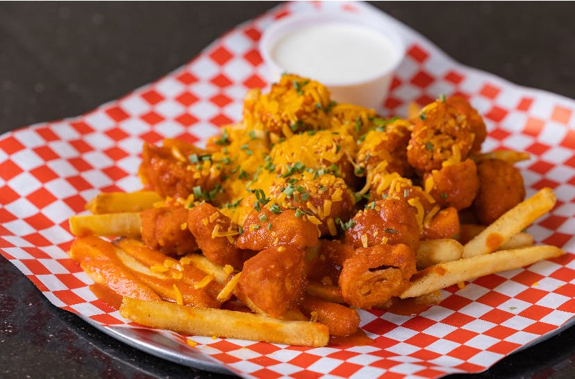Order Buffalo Chicken Fries - Appetizer food online from Zio's Pizza & Wings store, Mesa on bringmethat.com