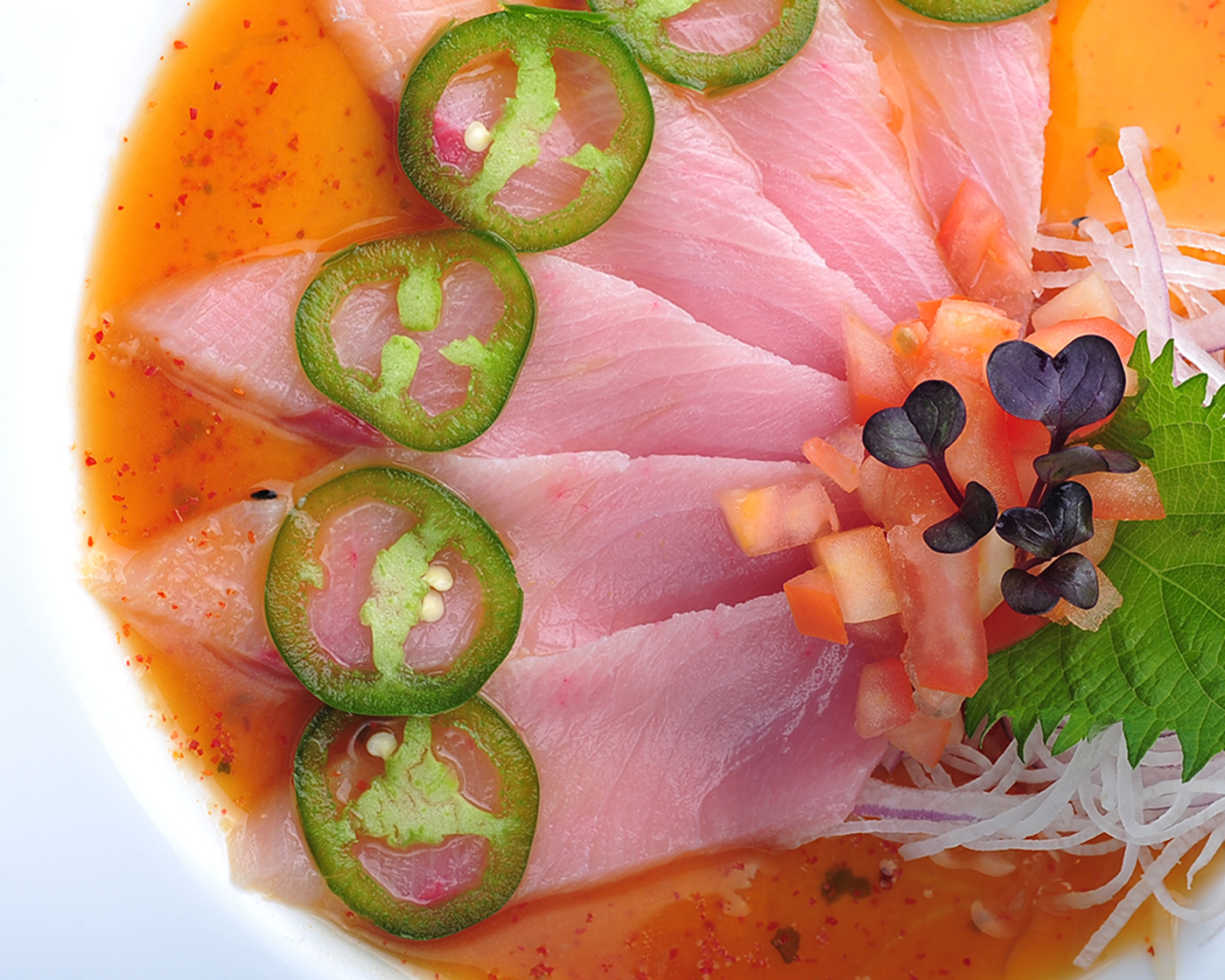 Order Yellowtail Carpaccio food online from Kabuki Japanese Restaurant - Burbank store, Burbank on bringmethat.com