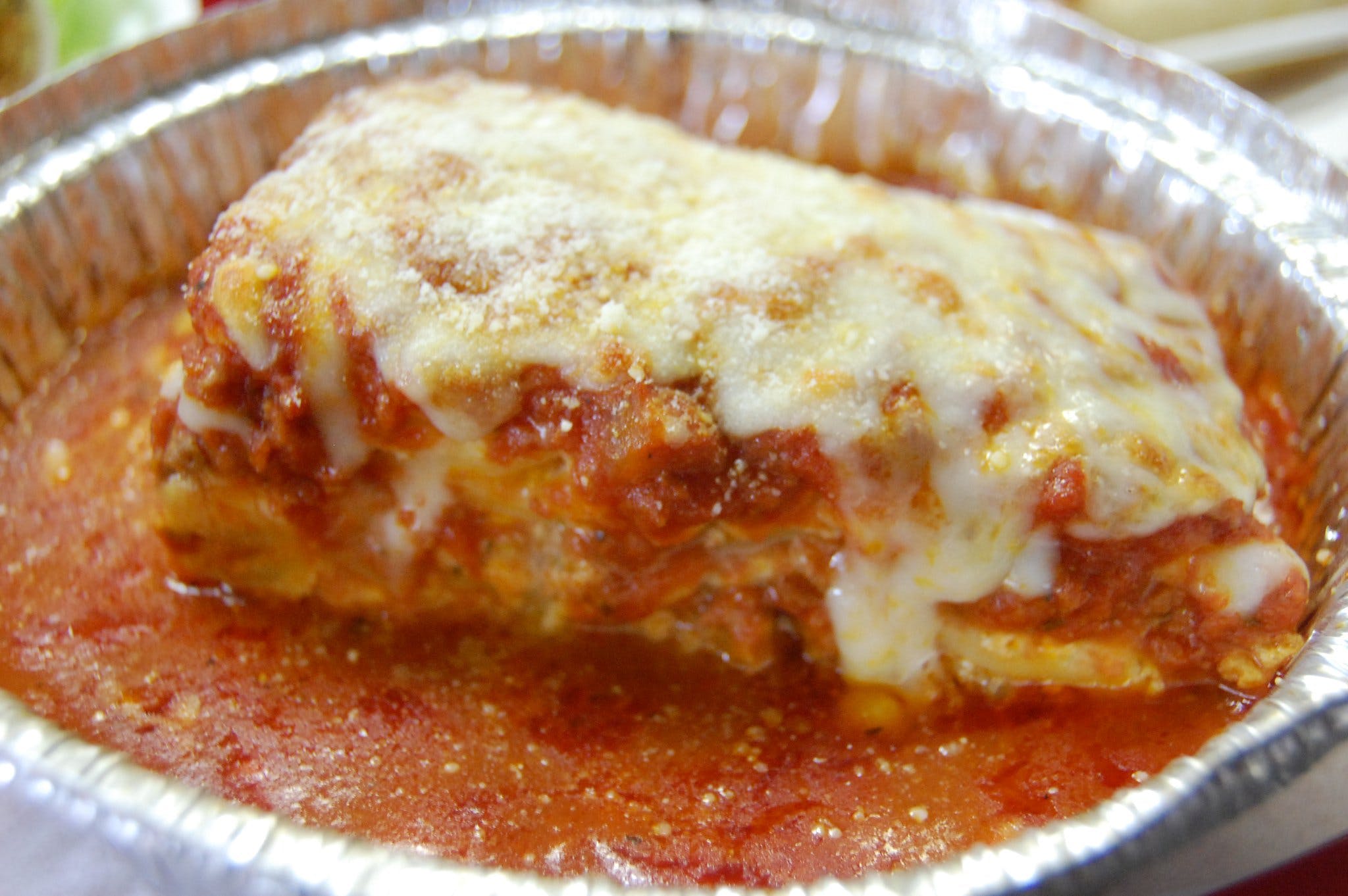 Order Lasagna - Dinner food online from Rosaria Pizza store, San Diego on bringmethat.com