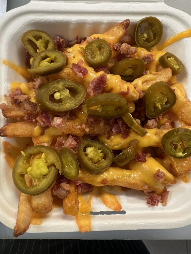 Order Loaded Fries food online from Cutting Edge Pizza & Wings store, Atlanta on bringmethat.com