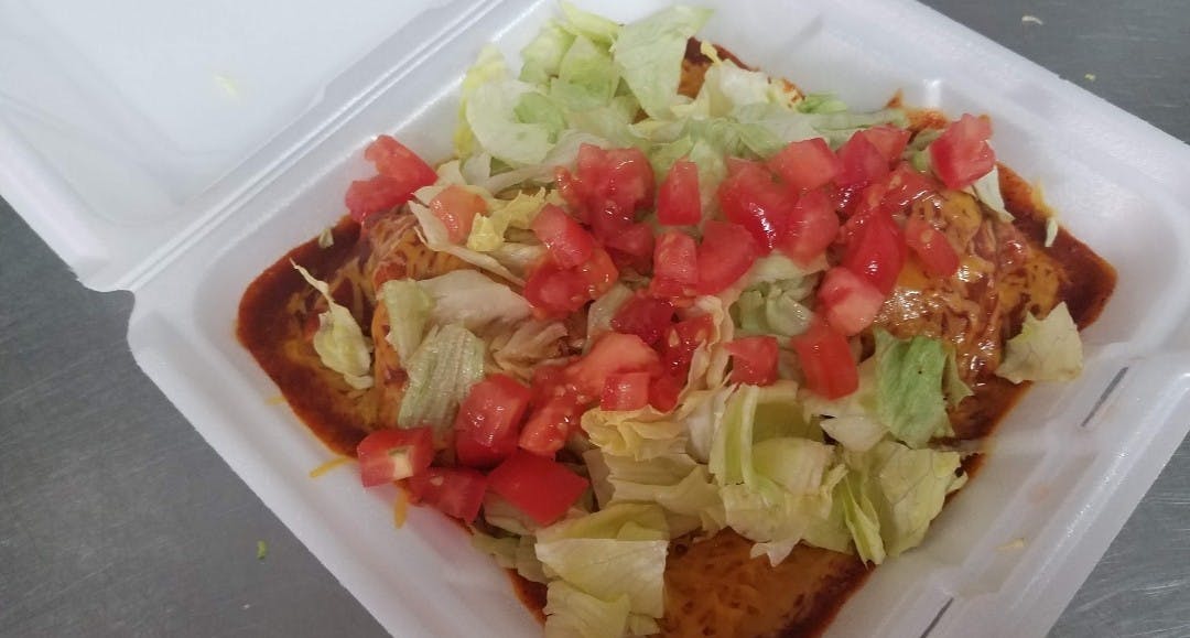 Order Wet Meat Burrito - Burrito food online from Northside Pizza store, Hastings on bringmethat.com