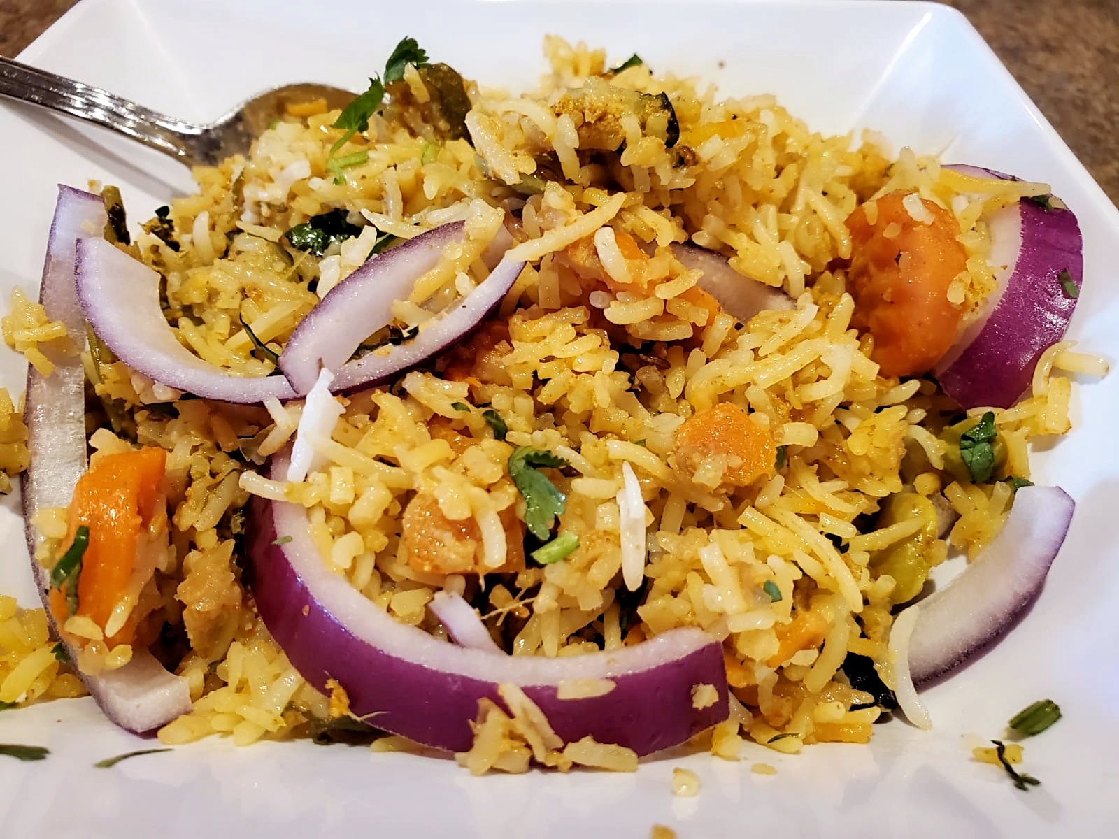 Order North Indian Style Vegetable Biryani food online from Crown Of India Restaurant store, Plainsboro on bringmethat.com