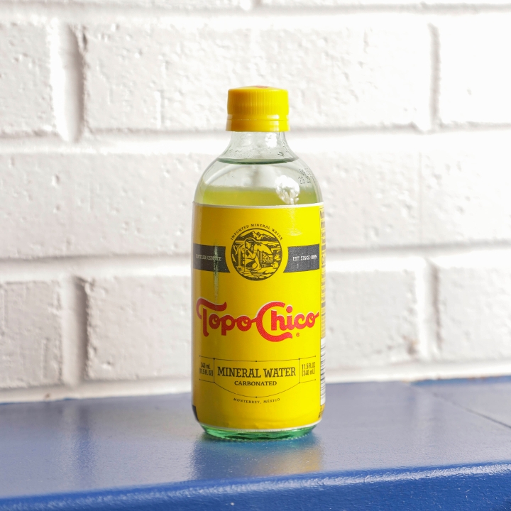 Order Topo Chico Mineral Water food online from Totopos store, Cary on bringmethat.com