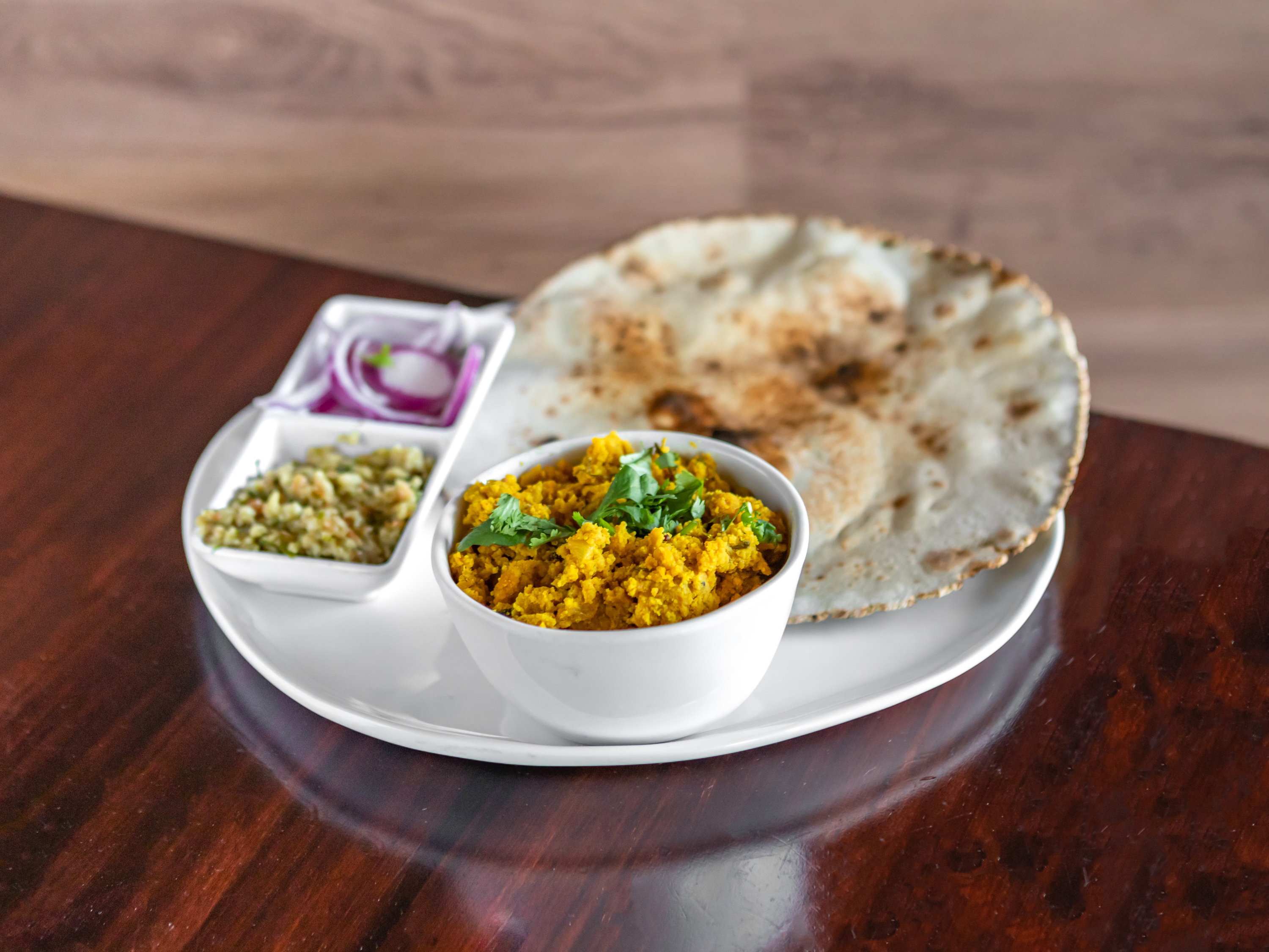 Order Zunka, Bhakri and Thecha food online from Annapoorna Restaurant store, Milpitas on bringmethat.com
