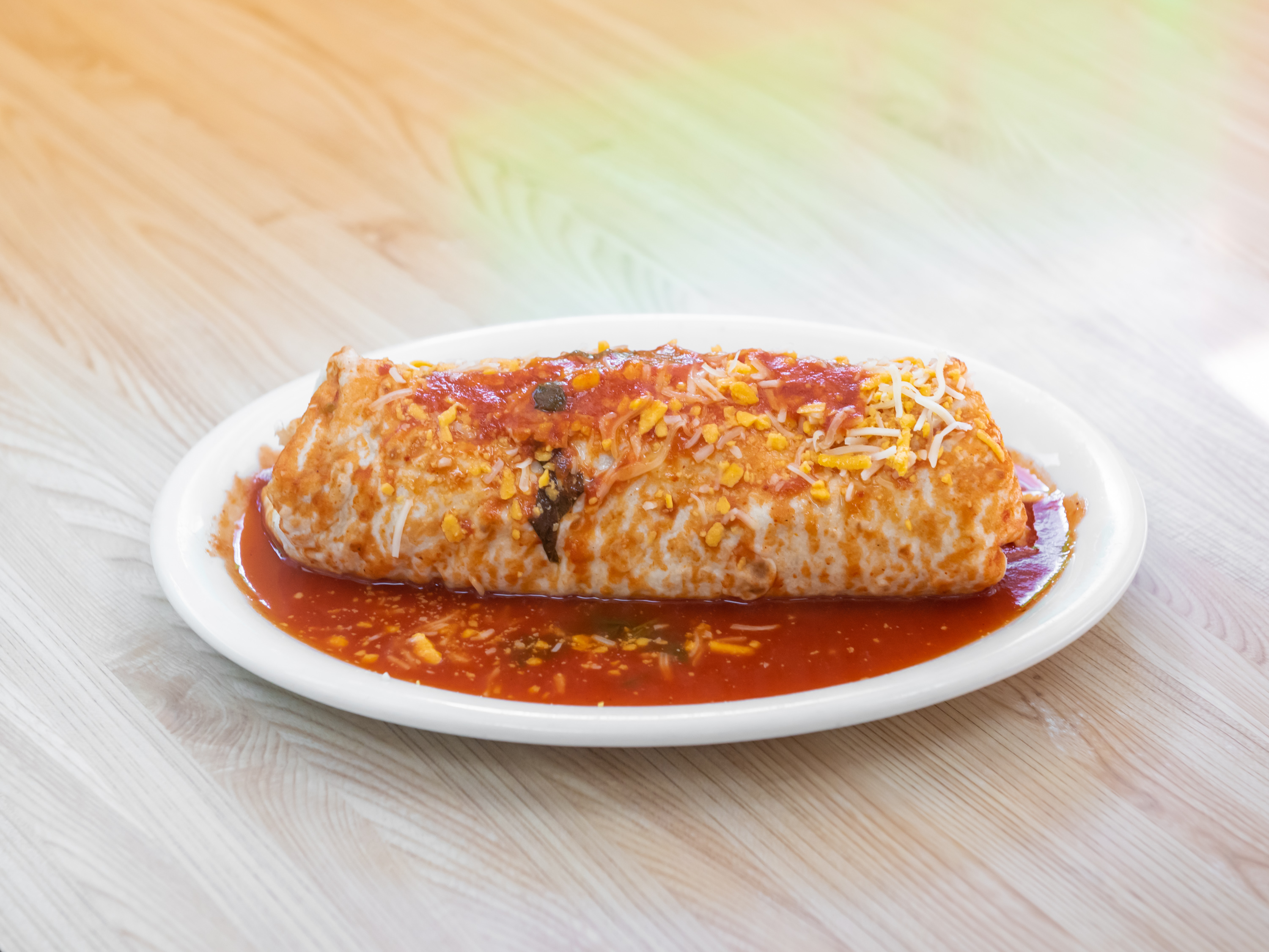 Order Chile Rojo Burrito food online from Boulevard Cafe store, Palmdale on bringmethat.com