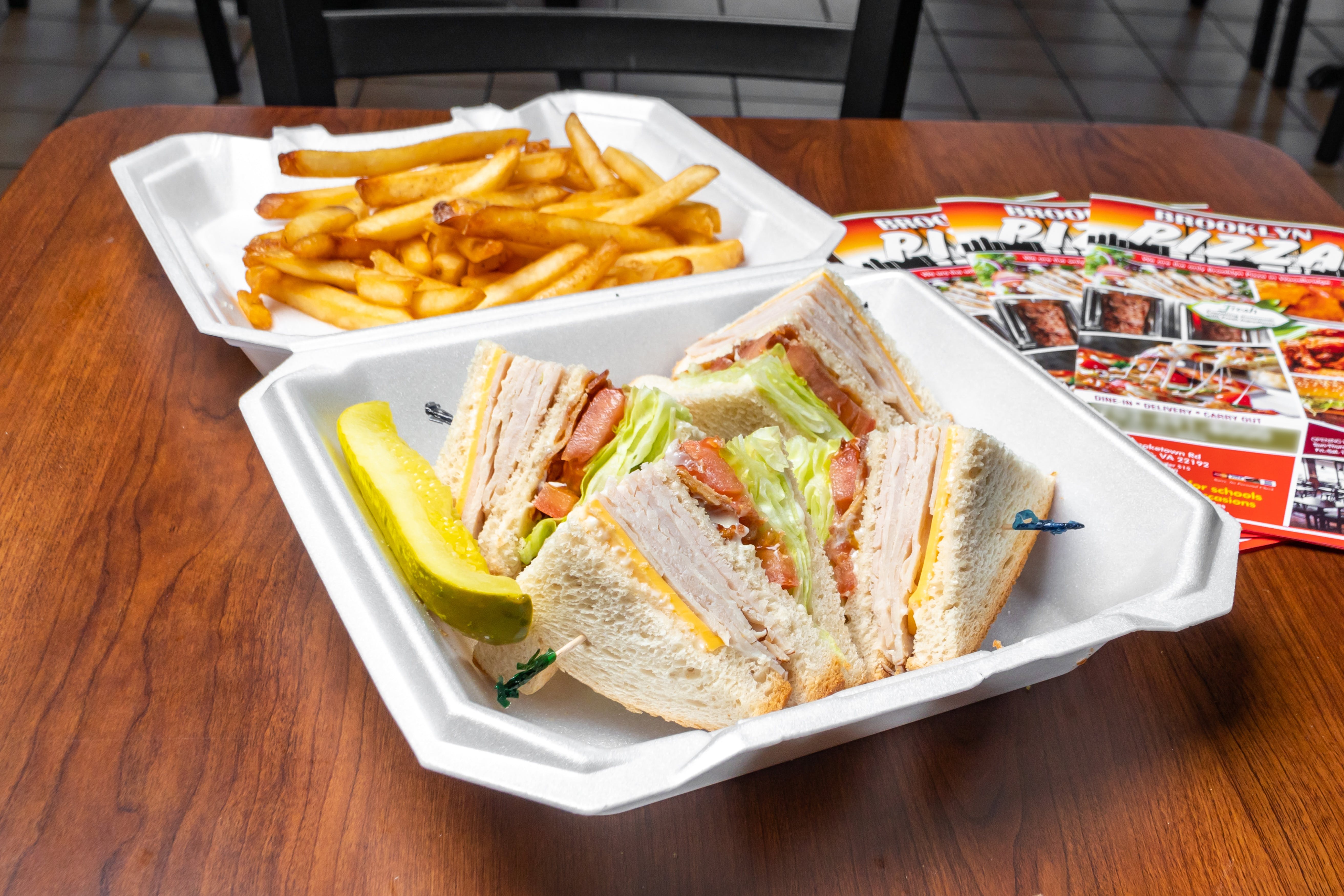 Order Turkey Club Sandwich - Sandwich food online from Brooklyn Pizza store, Woodbridge on bringmethat.com