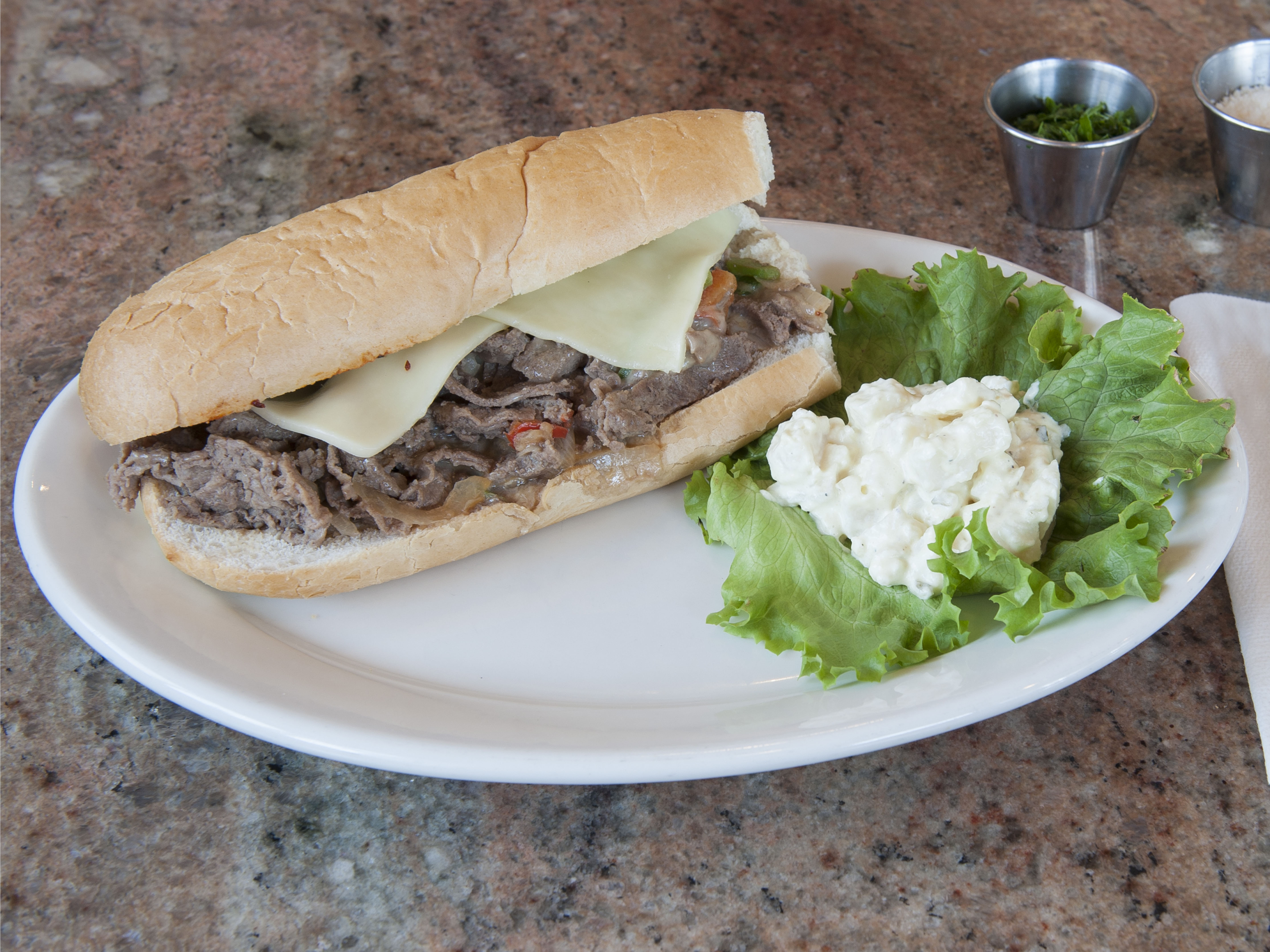 Order Philly Cheese Steak Sandwich food online from Giuliano's Delicatessen and Bakery store, Torrance on bringmethat.com