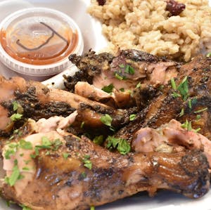 Order Jerk Chicken Served on Rice & Peas food online from Trap Fusion store, Cordova on bringmethat.com