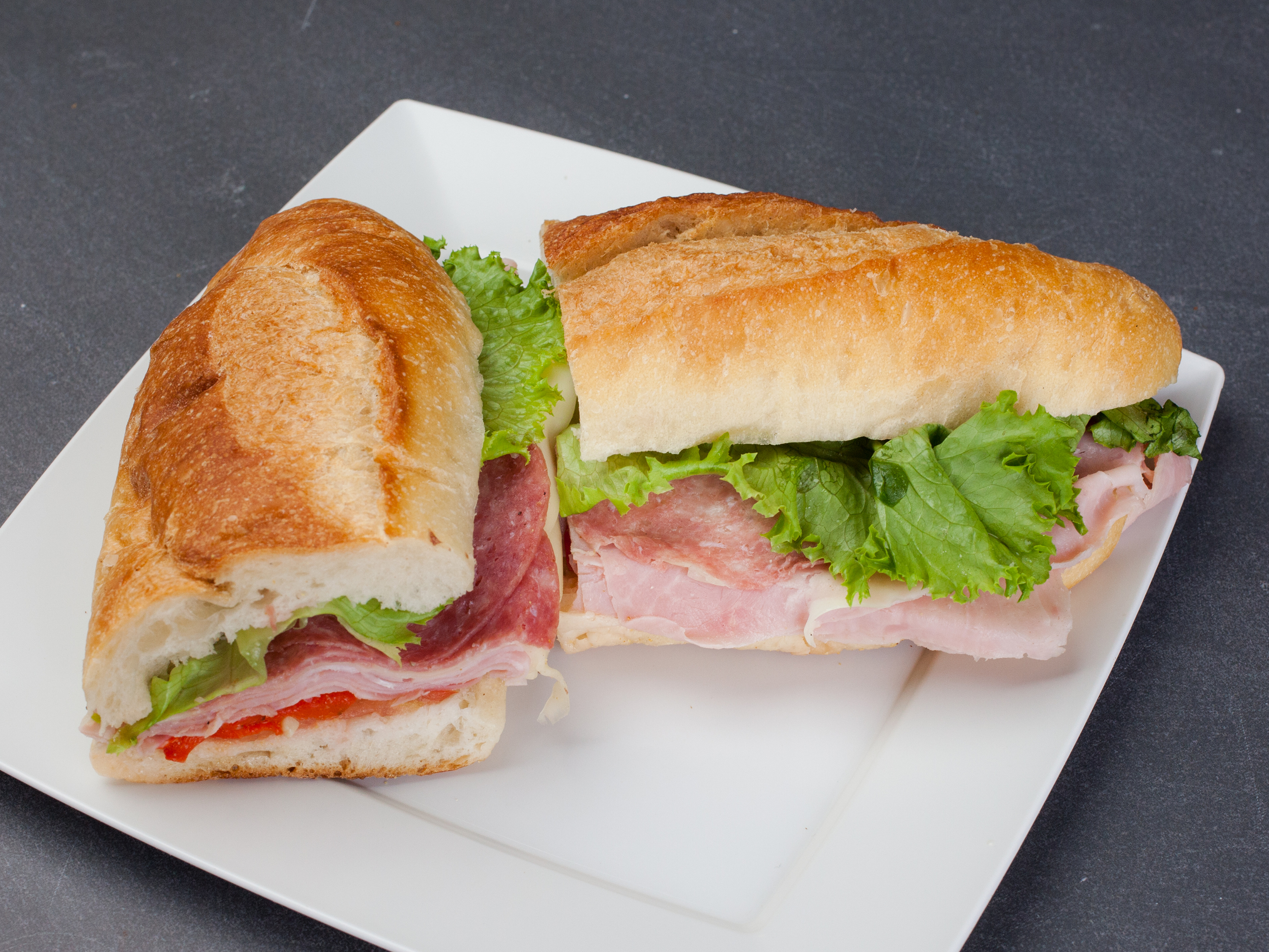 Order 5. Ham and Salami Sandwich food online from Benvenuti store, New York on bringmethat.com