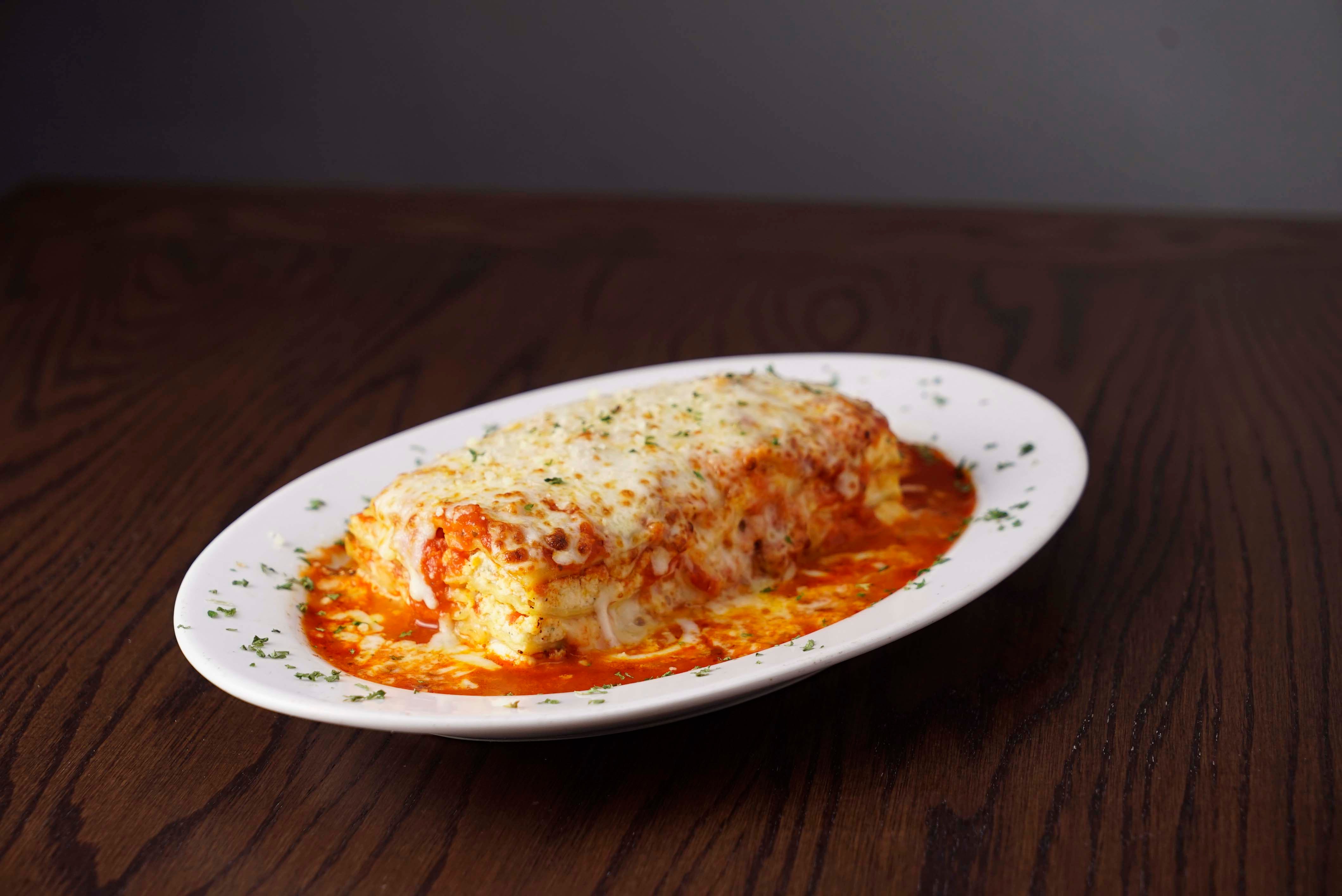 Order Baked Lasagna - Pasta food online from Rosati Pizza store, Maricopa on bringmethat.com