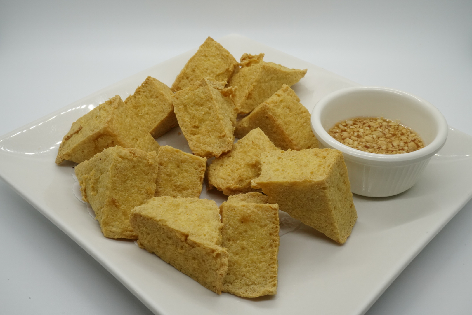 Order 8. Twelve Pieces Tofu Delight food online from Royal Orchid Thai II store, Riverside on bringmethat.com