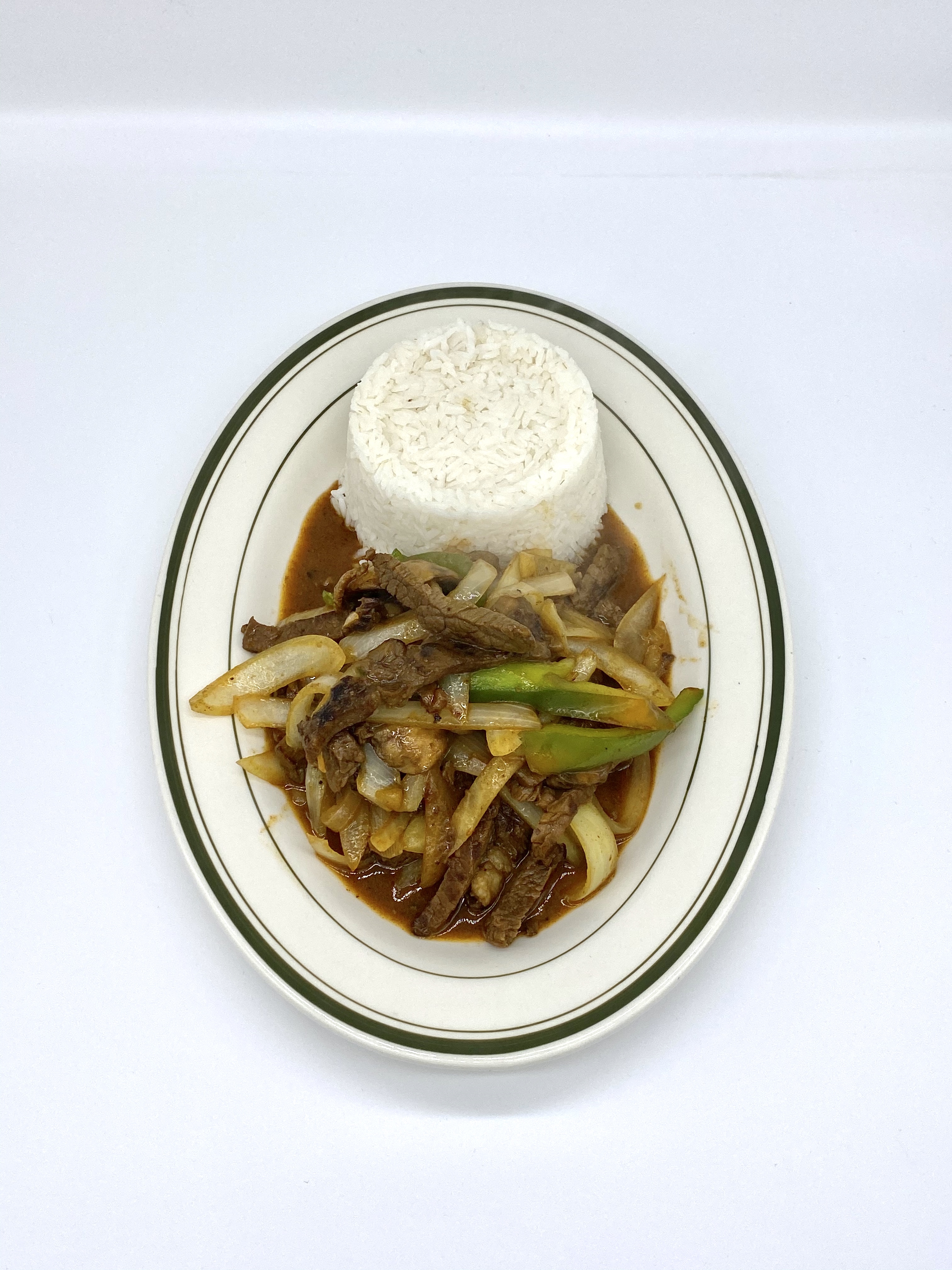 Order 18. Steak over Rice food online from Tacos Y Jugos Genesis store, Elmhurst on bringmethat.com