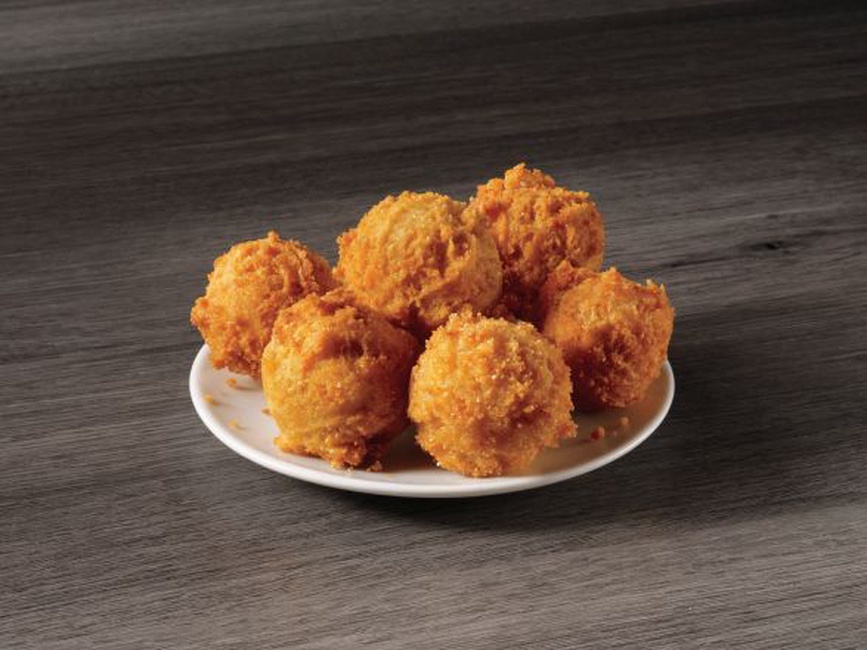 Order 6 Hush Puppies food online from Captain D's Seafood store, Wetumpka on bringmethat.com