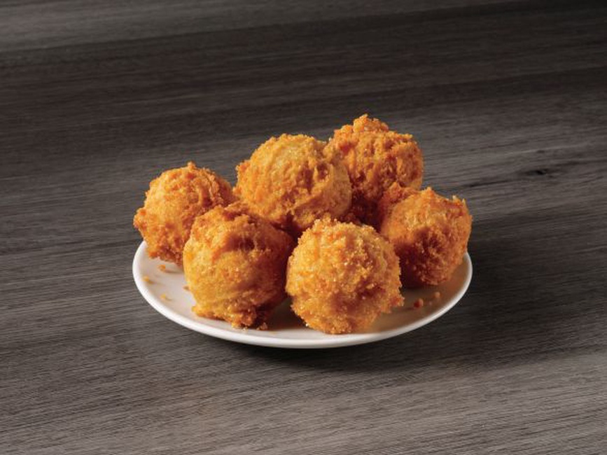 Order 6 Hush Puppies food online from Captain D's Seafood store, Carrollton on bringmethat.com