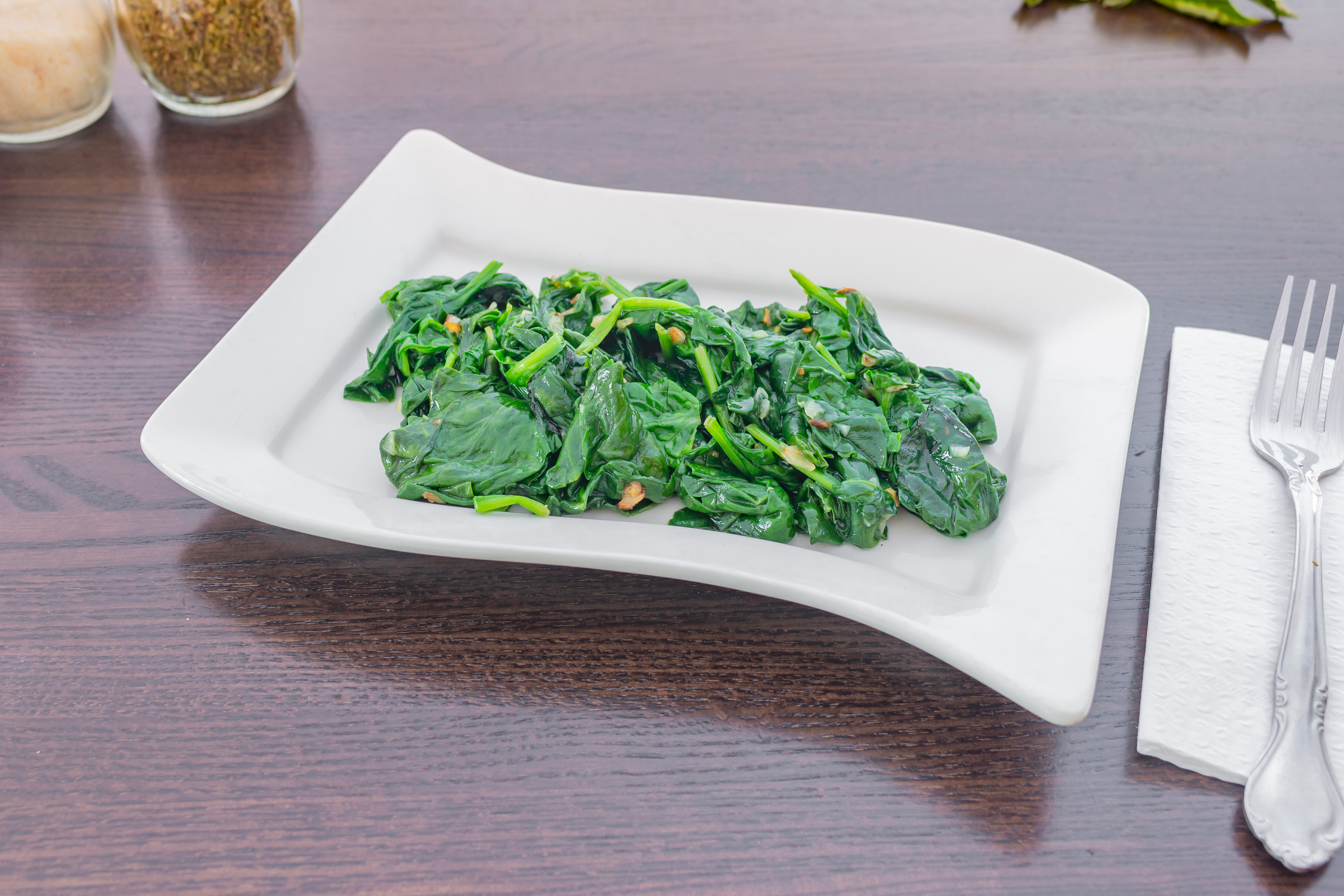 Order Side of Spinach with Garlic Oil food online from Nino's Pizza & Restaurant store, Hillsdale on bringmethat.com