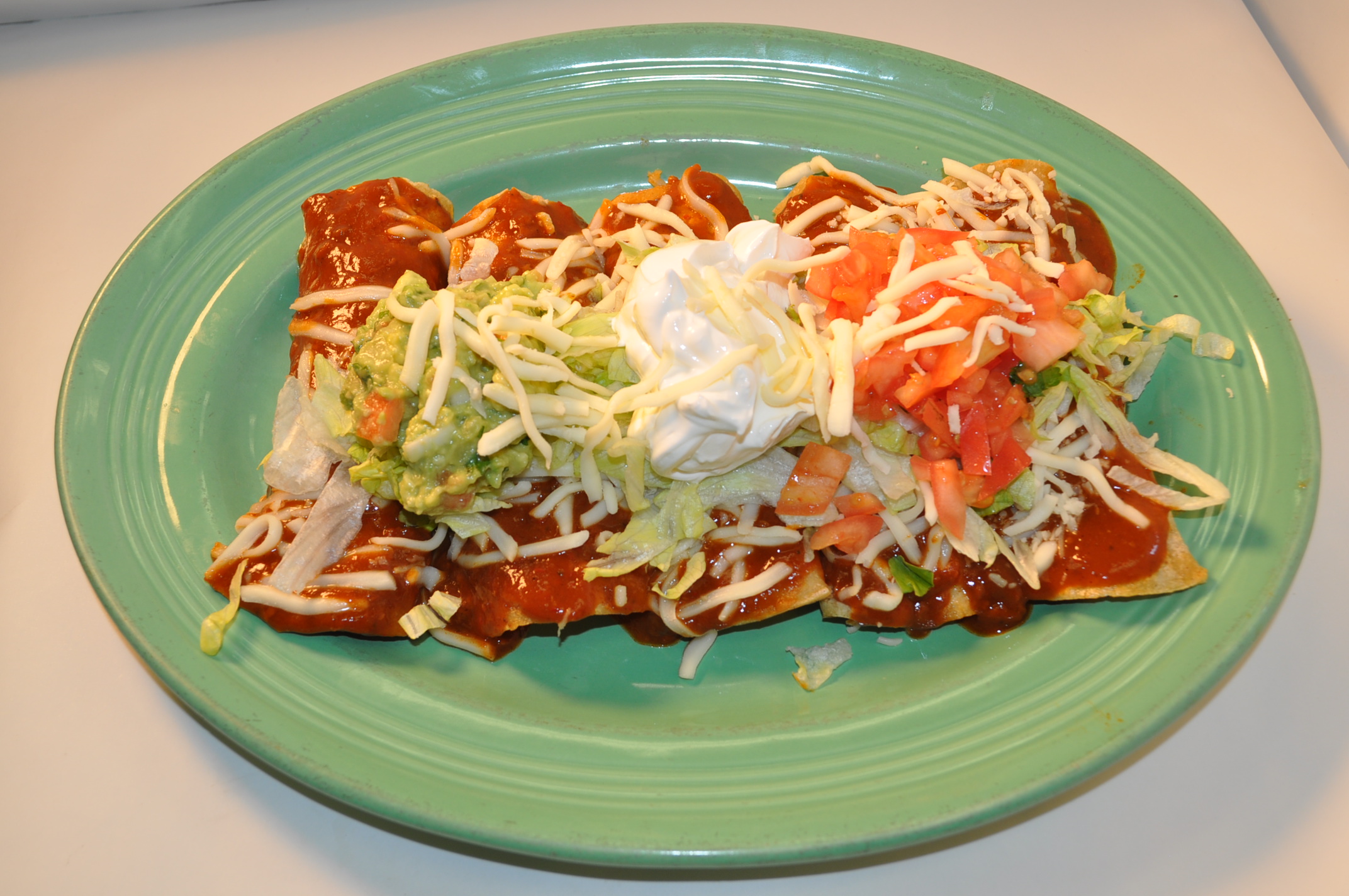 Order Enchiladas Supreme food online from Good Tequilas Mexican Grill store, Glendale Heights on bringmethat.com
