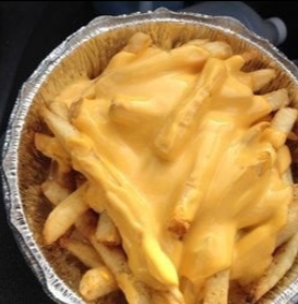 Order French Fries with Nacho Cheese food online from Wings Things and More store, Parkville on bringmethat.com