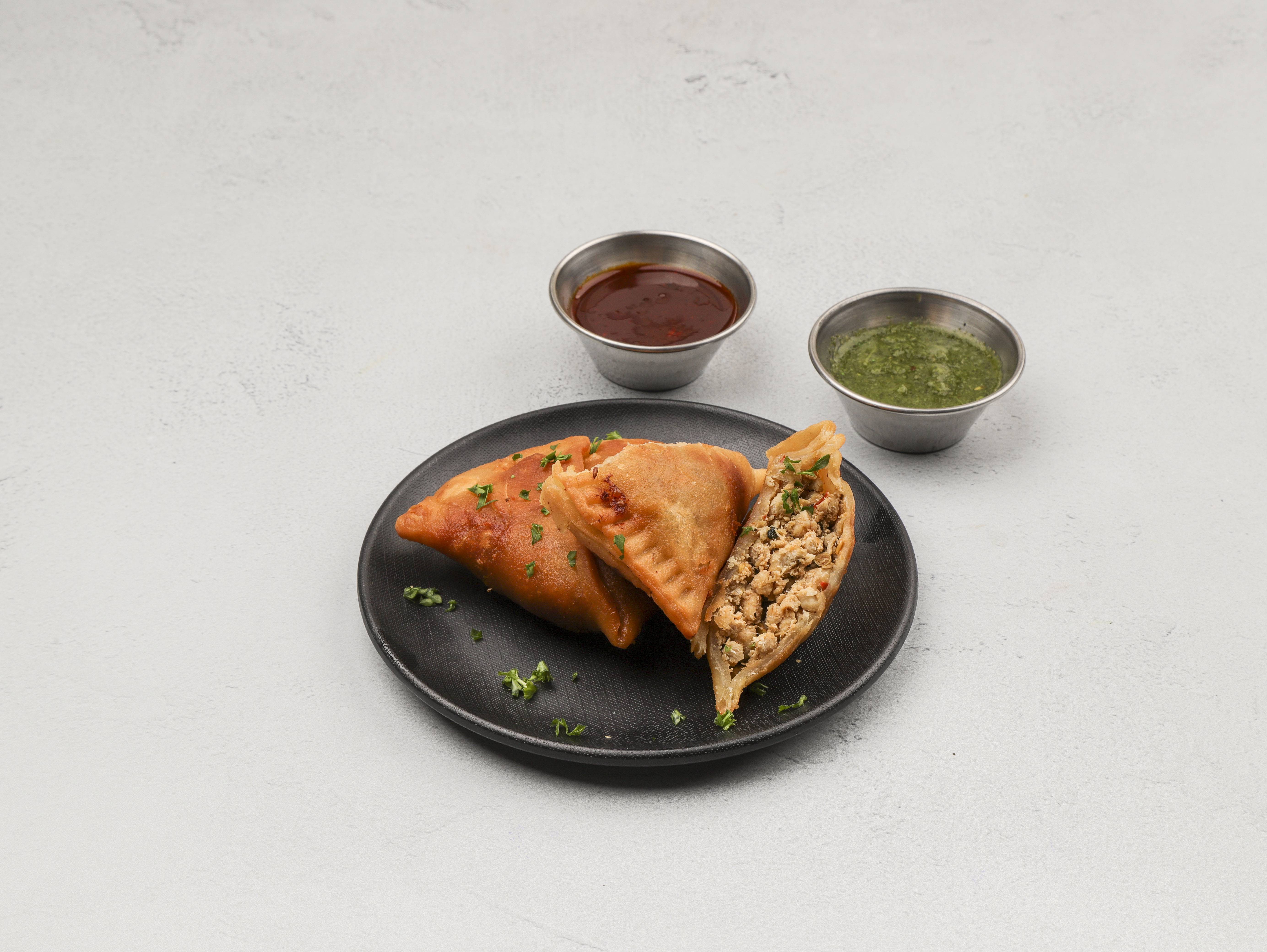 Order Meat Samosa food online from Taste Of India store, St. Louis on bringmethat.com