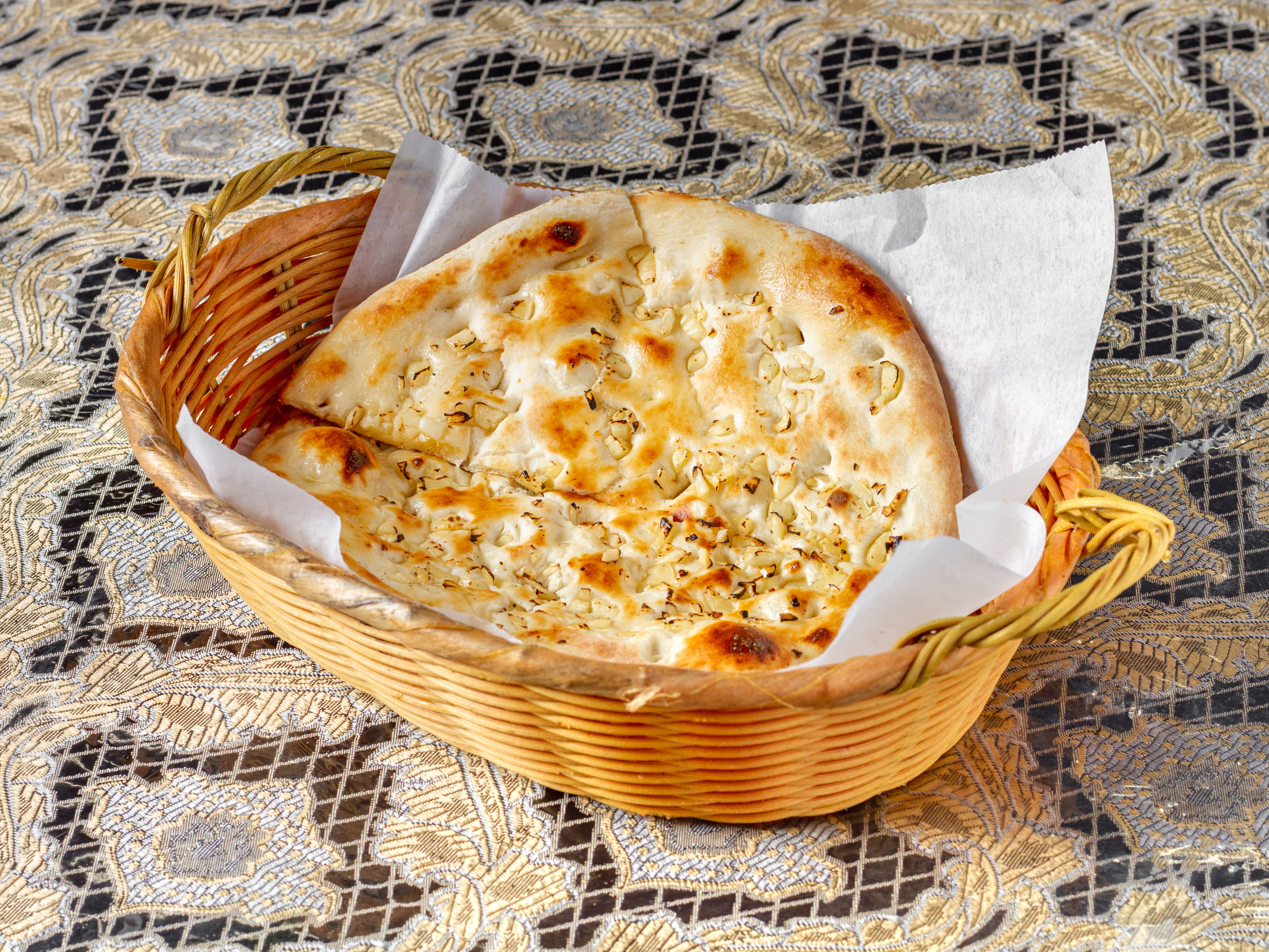 Order Garlic Naan food online from Azan Karahi & Kabab store, Windsor Mill on bringmethat.com