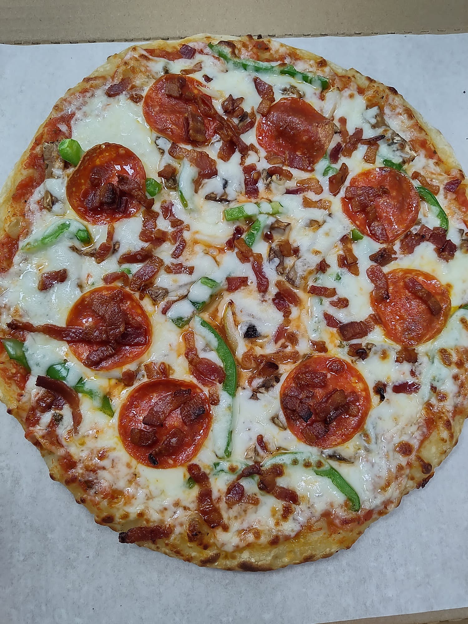 Order Combination Pizza - Medium 11" food online from Bells Pizza Company store, Bellflower on bringmethat.com