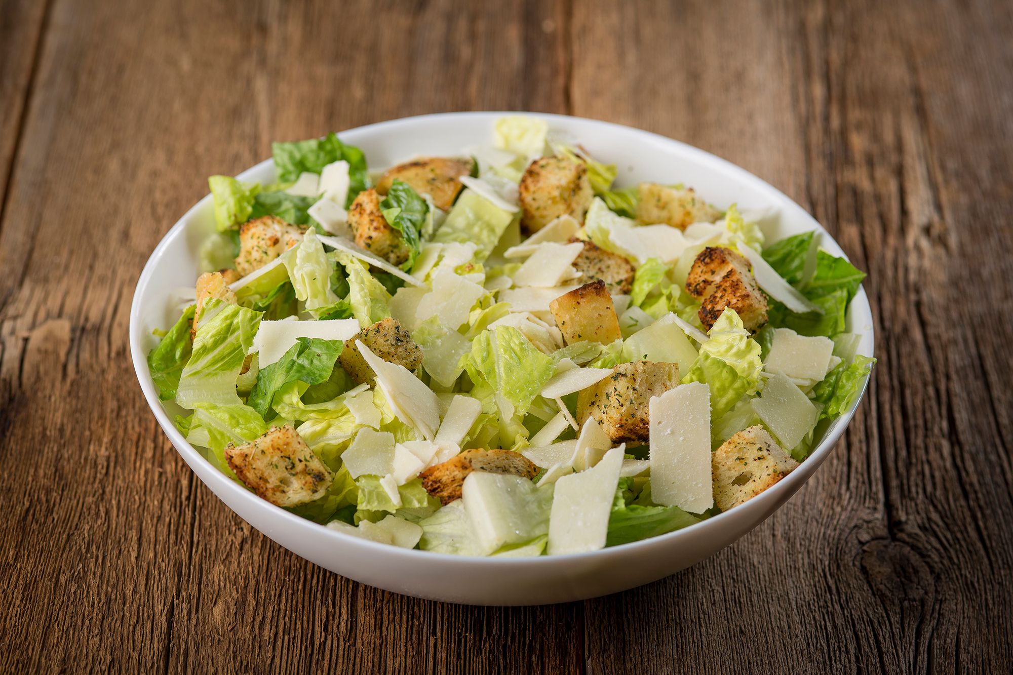 Order Caesar Salad food online from Rosatis Pizza store, Deerfield on bringmethat.com