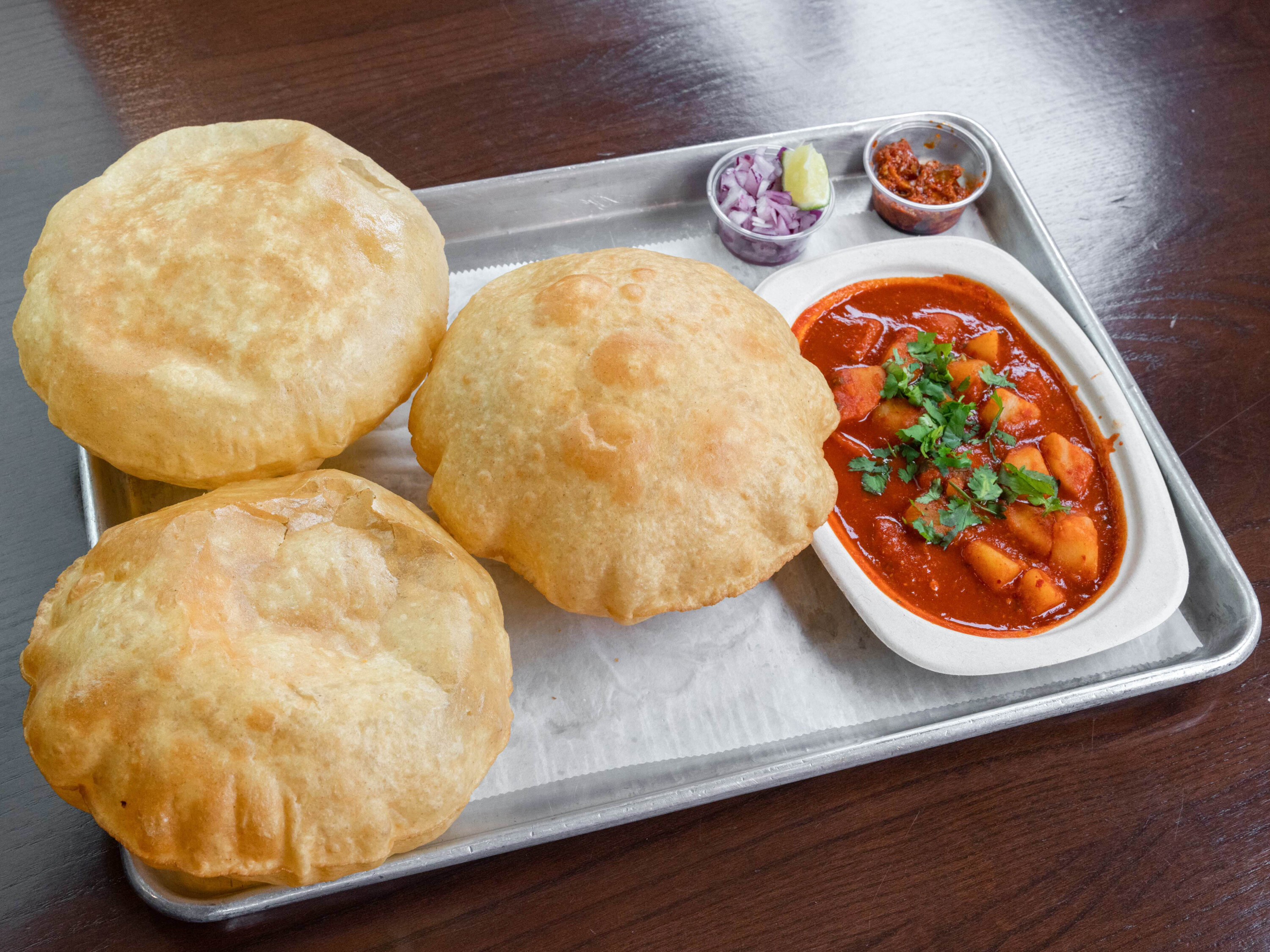 Order Puri Bhaji food online from Surati Indian Street Food store, Nashville on bringmethat.com