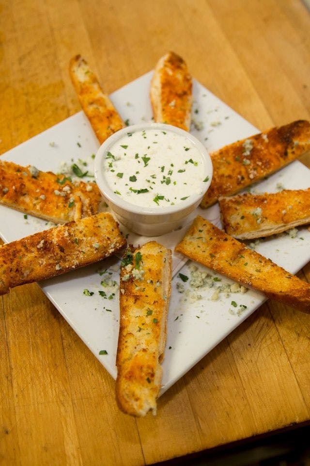 Order Garlic Bread - Appetizer food online from Jack's Brick Oven Pizzeria Restaurant store, Norwich on bringmethat.com
