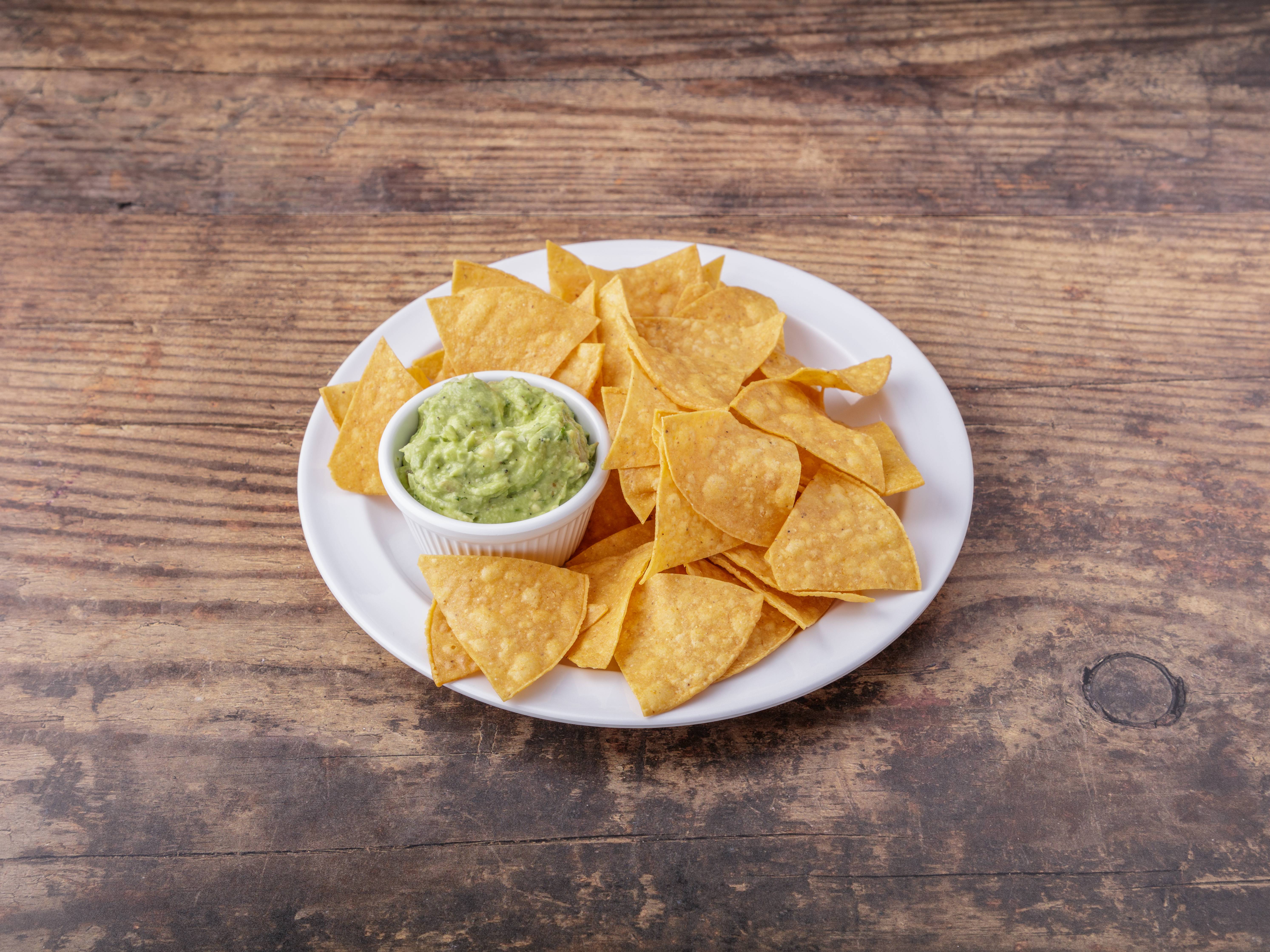 Order Guacamole and Chips food online from Guajillo store, New York on bringmethat.com